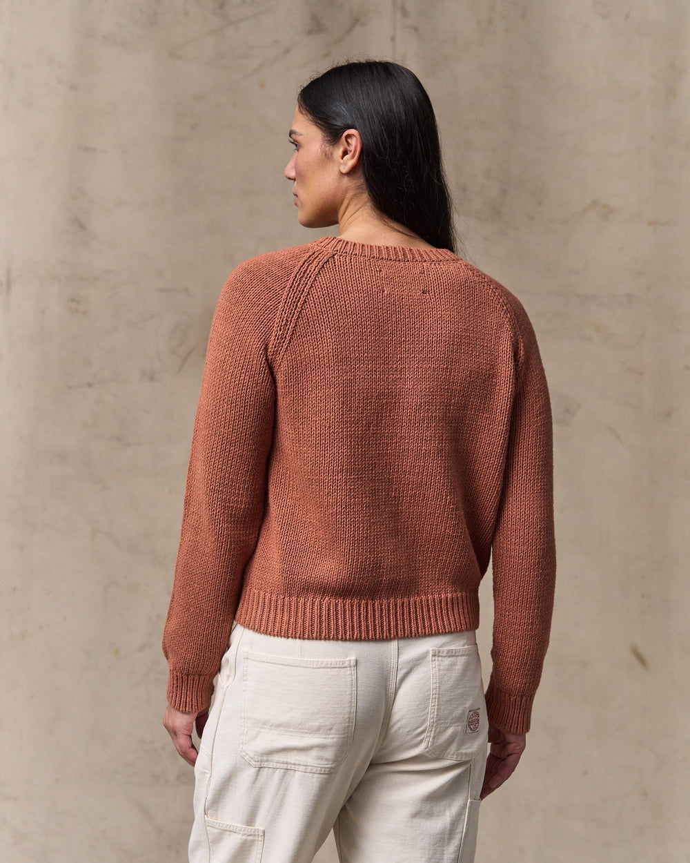 image of a model wearing Filson's Women's Cotton Crewneck Sweater - Copper Brown