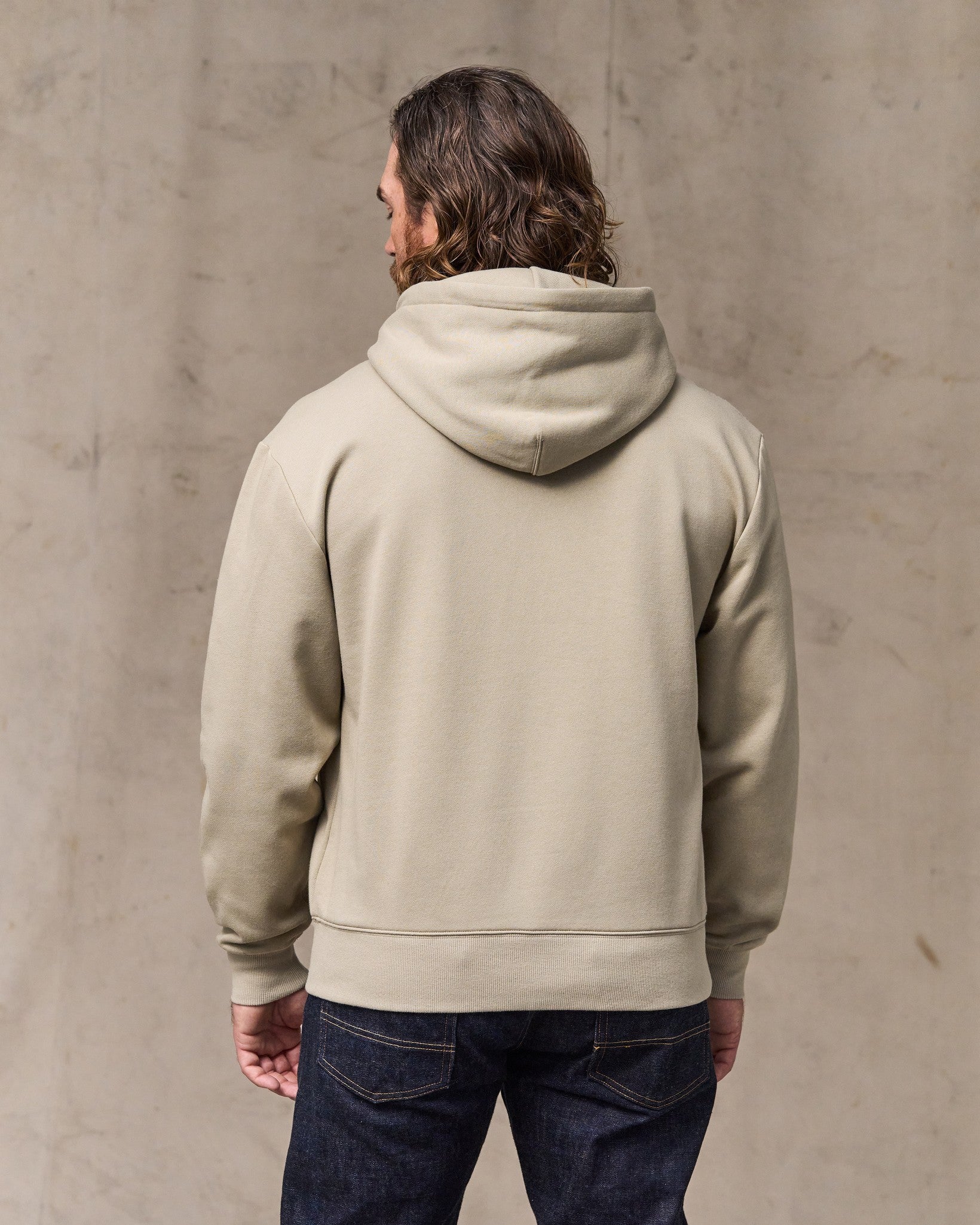 image of a model wearing Filson's Northwest Hoodie - Silver Sage