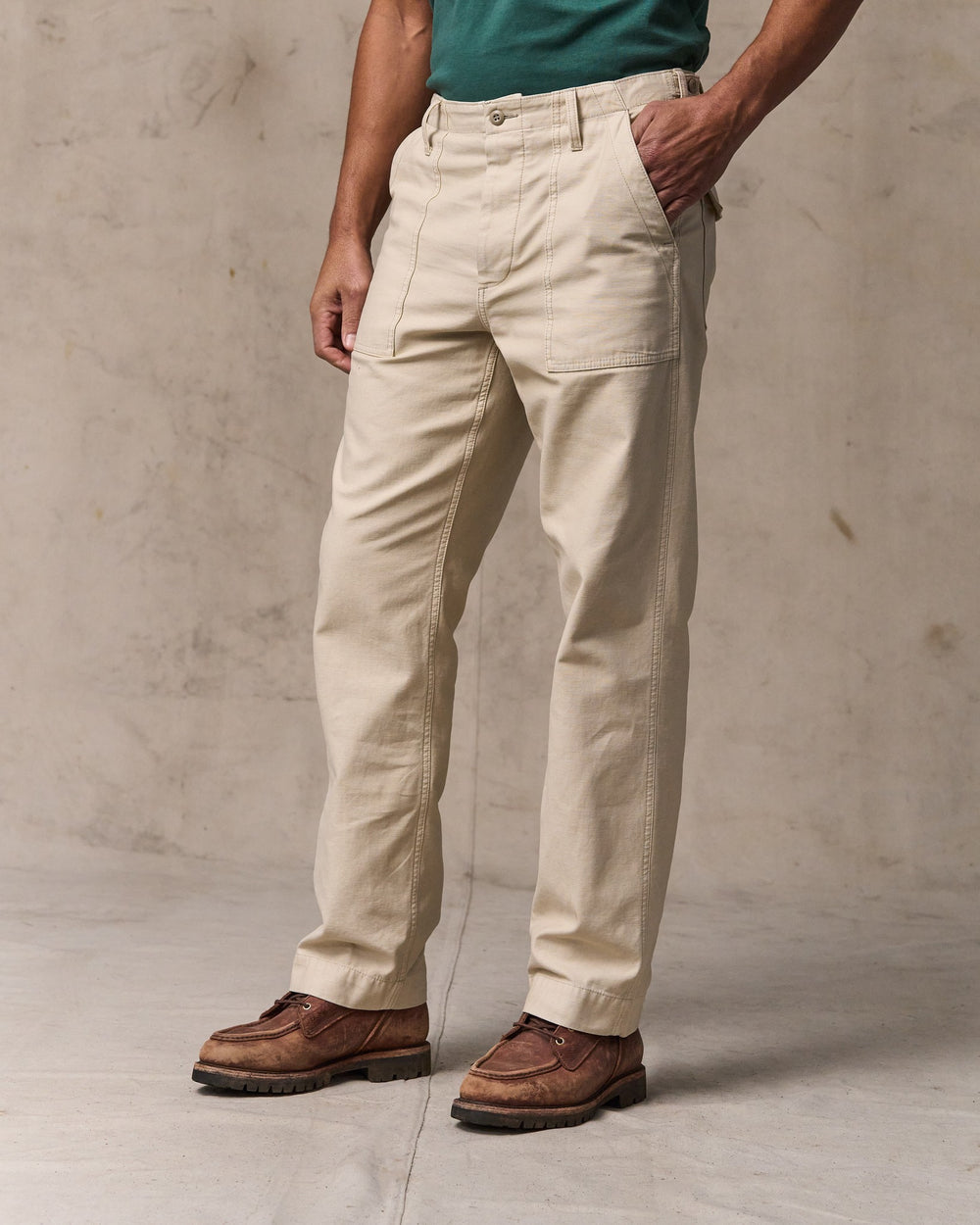 image of a model wearing Filson's Field Supply Pants - Washed Oatmeal
