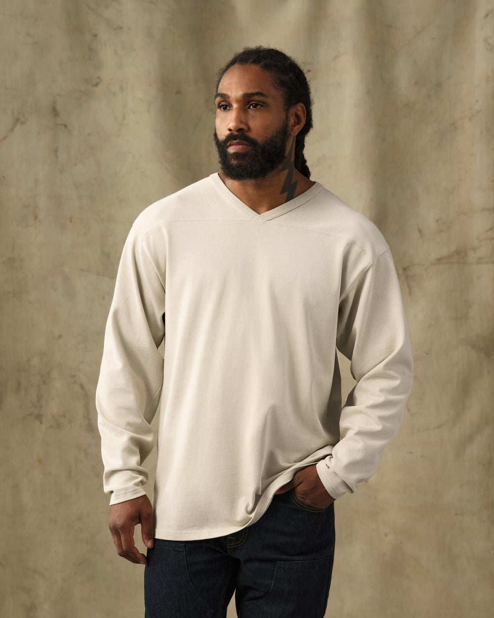 image of a model wearing Filson's Field Knit Sport Jersey - Oyster