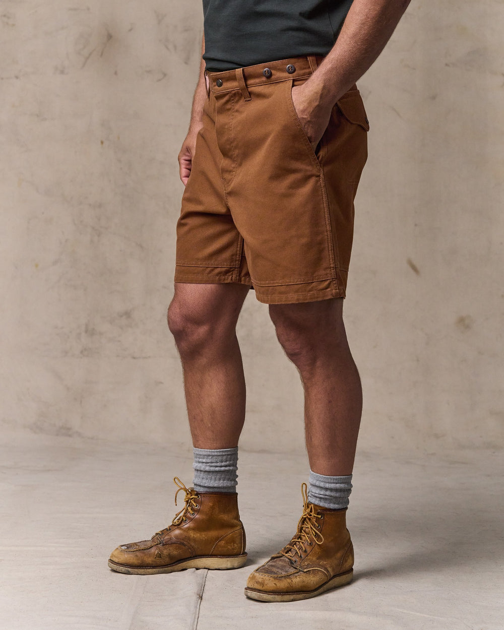 image of a model wearing Filson's Dry Tin Cloth Shorts  - Whiskey