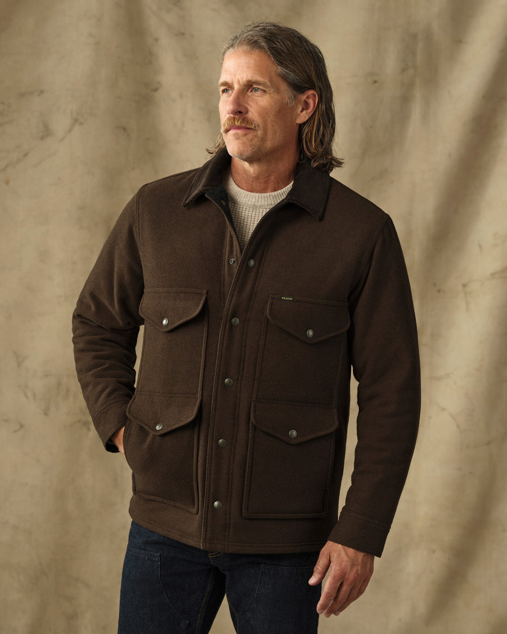 image of a model wearing Filson's Spokane Insulated Cruiser Jacket - Beaver Brown