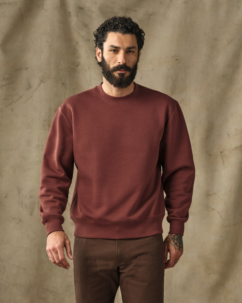 image of a model wearing Filson's Northwest Crewneck Sweatshirt - Sequoia