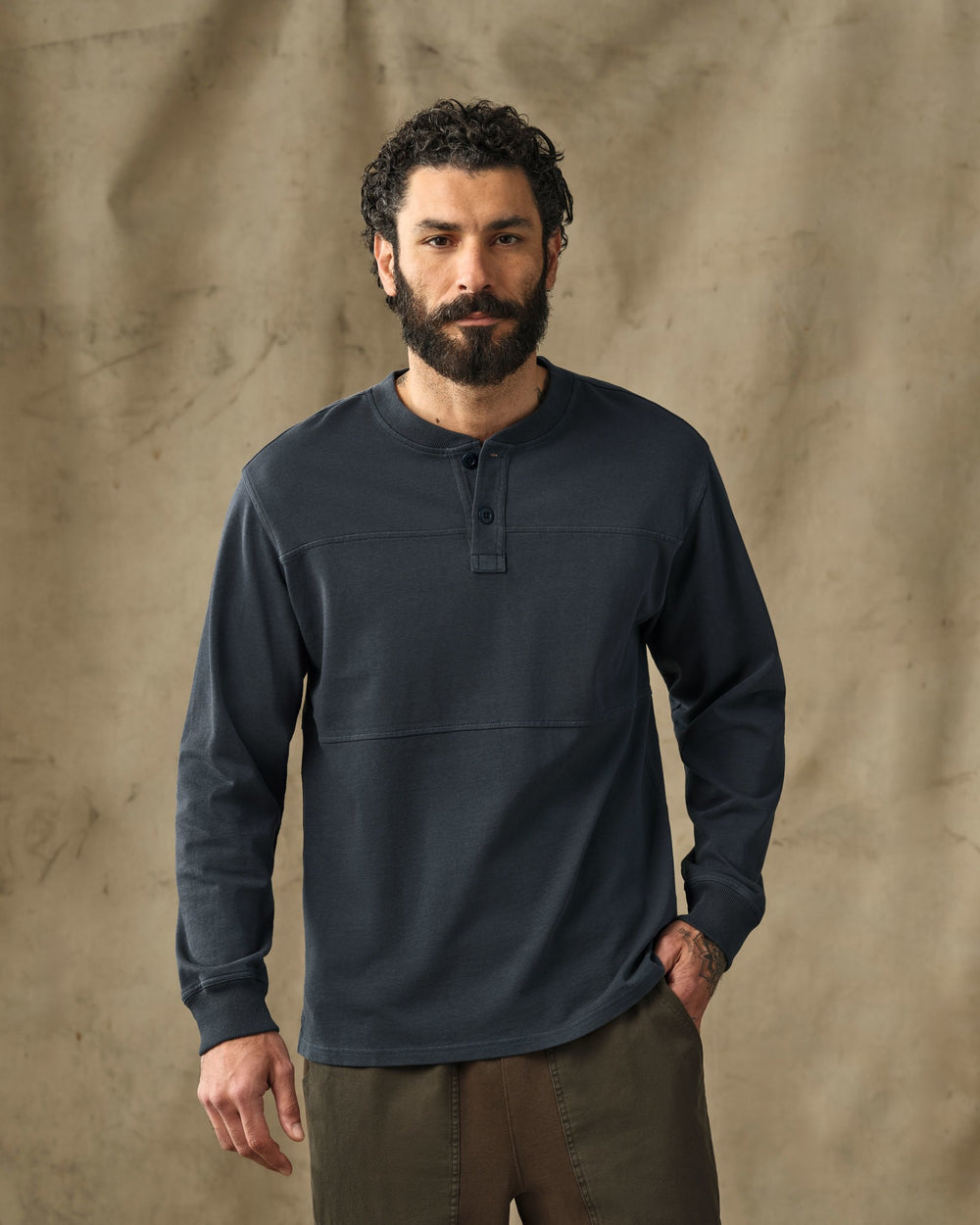 image of a model wearing Filson's Field Knit Henley - Bluefin