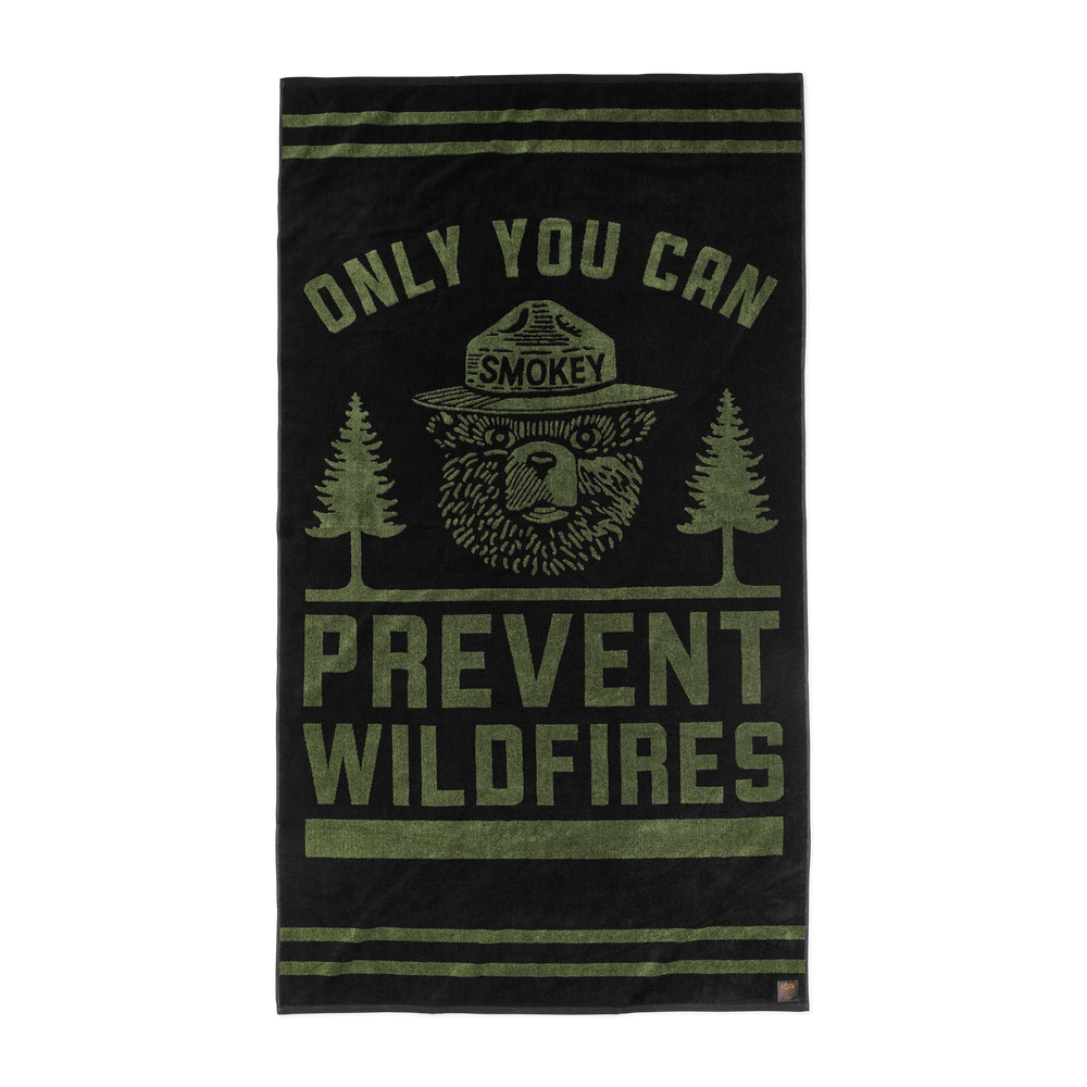Front-facing image of the Filson Smokey Bear Towel - Black / Olive / Smokey