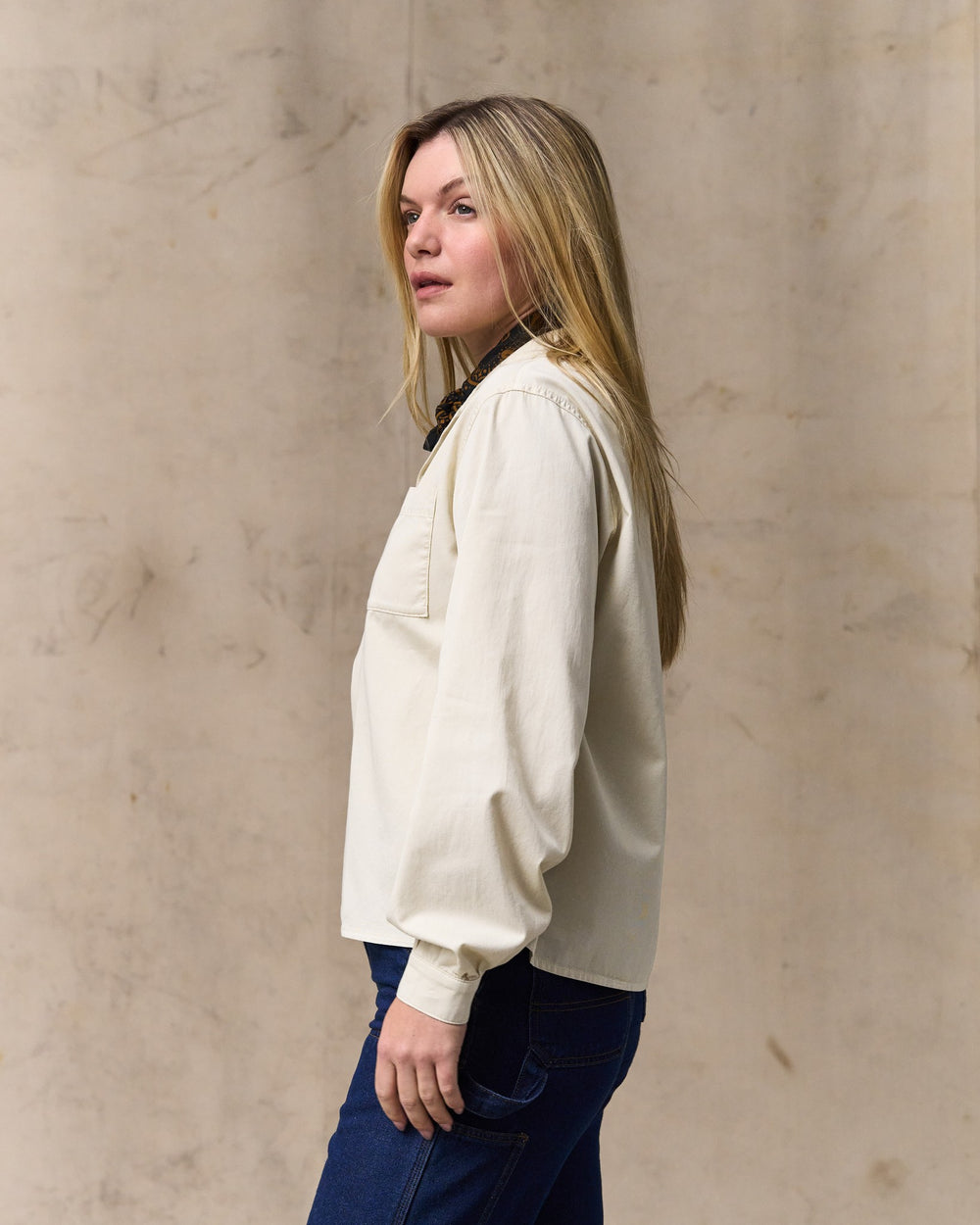 image of a model wearing Filson's Women's Long Sleeve Twill Camp Shirt - Cream