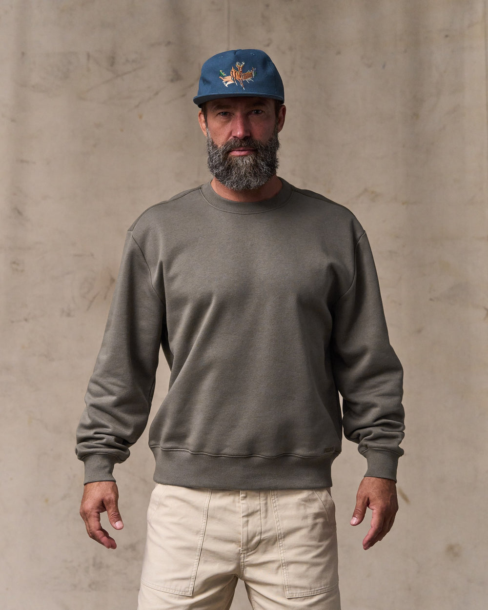 image of a model wearing Filson's Northwest Crewneck Sweatshirt - Hawk Brown