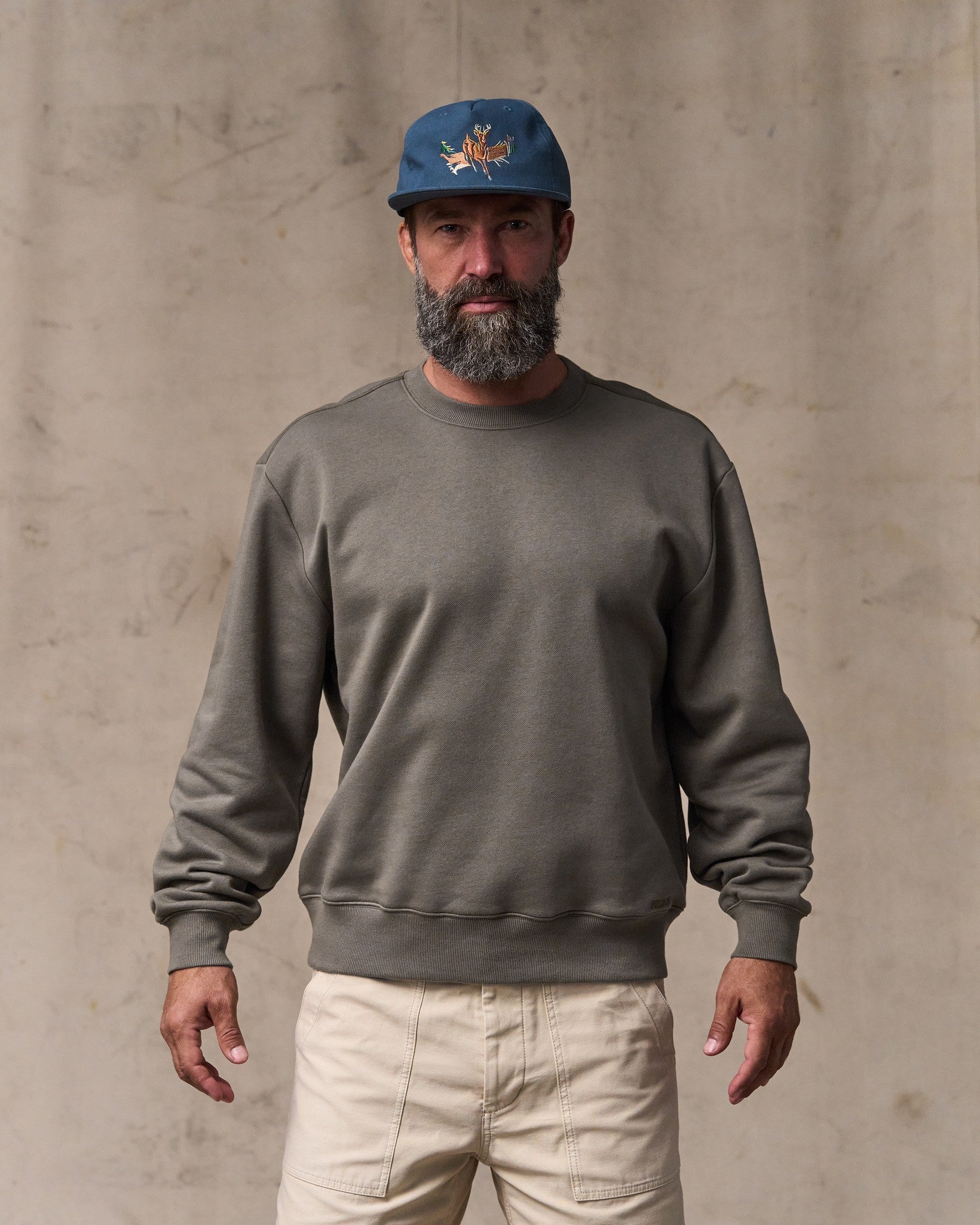 image of a model wearing Filson's Northwest Crewneck Sweatshirt - Hawk Brown