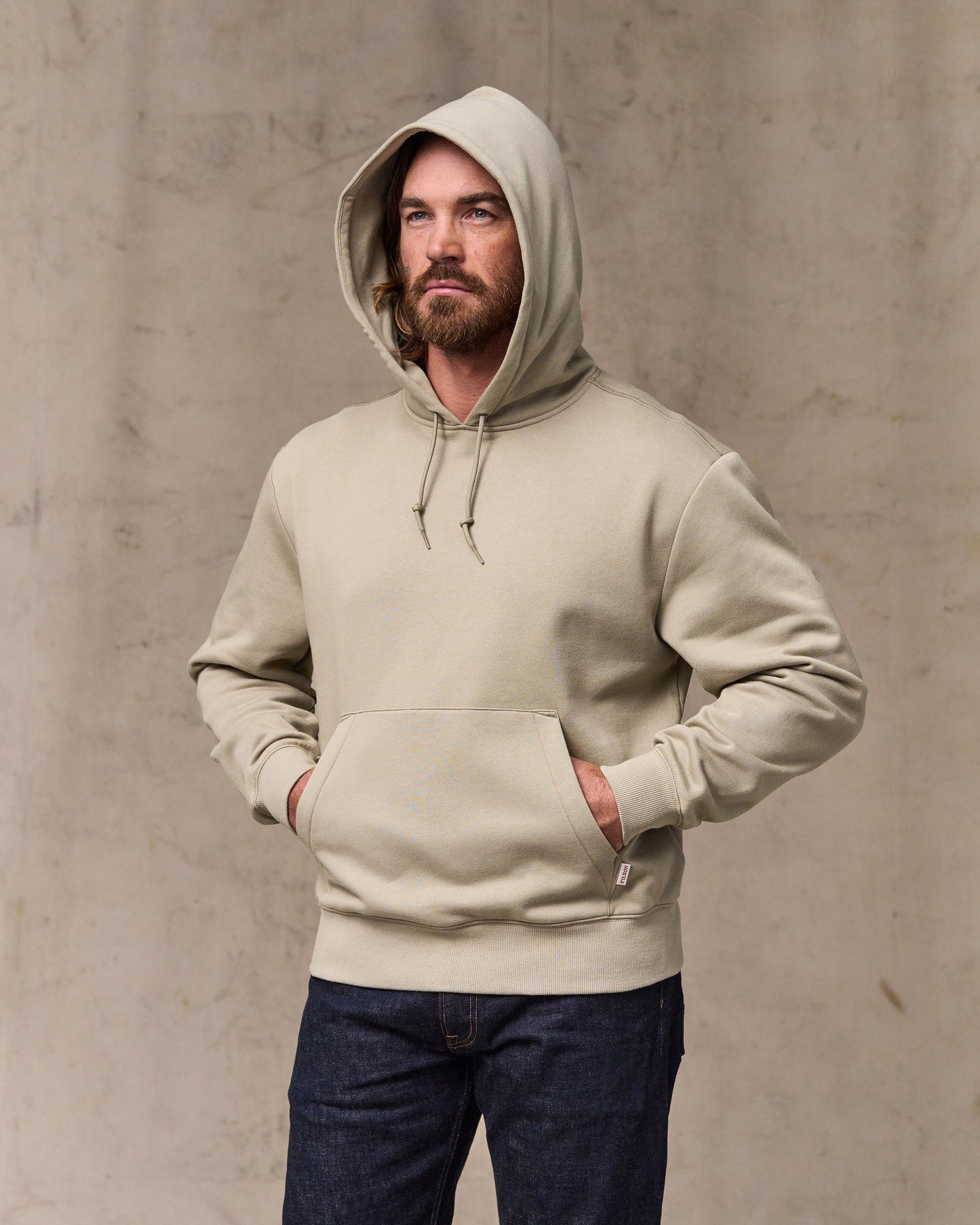 image of a model wearing Filson's Northwest Hoodie - Silver Sage