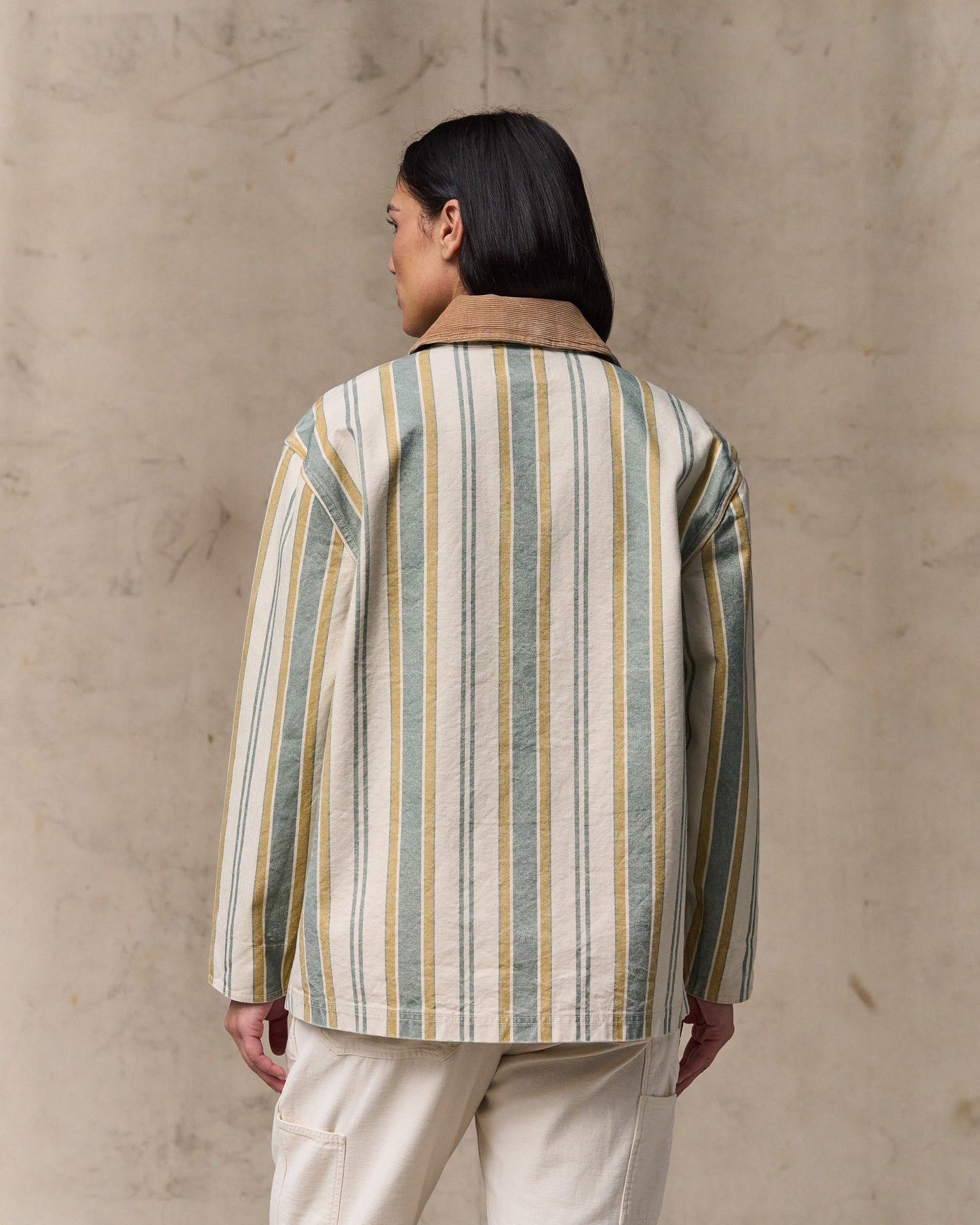 image of a model wearing Filson's Women's Canvas Barn Coat - Natural / Yellow