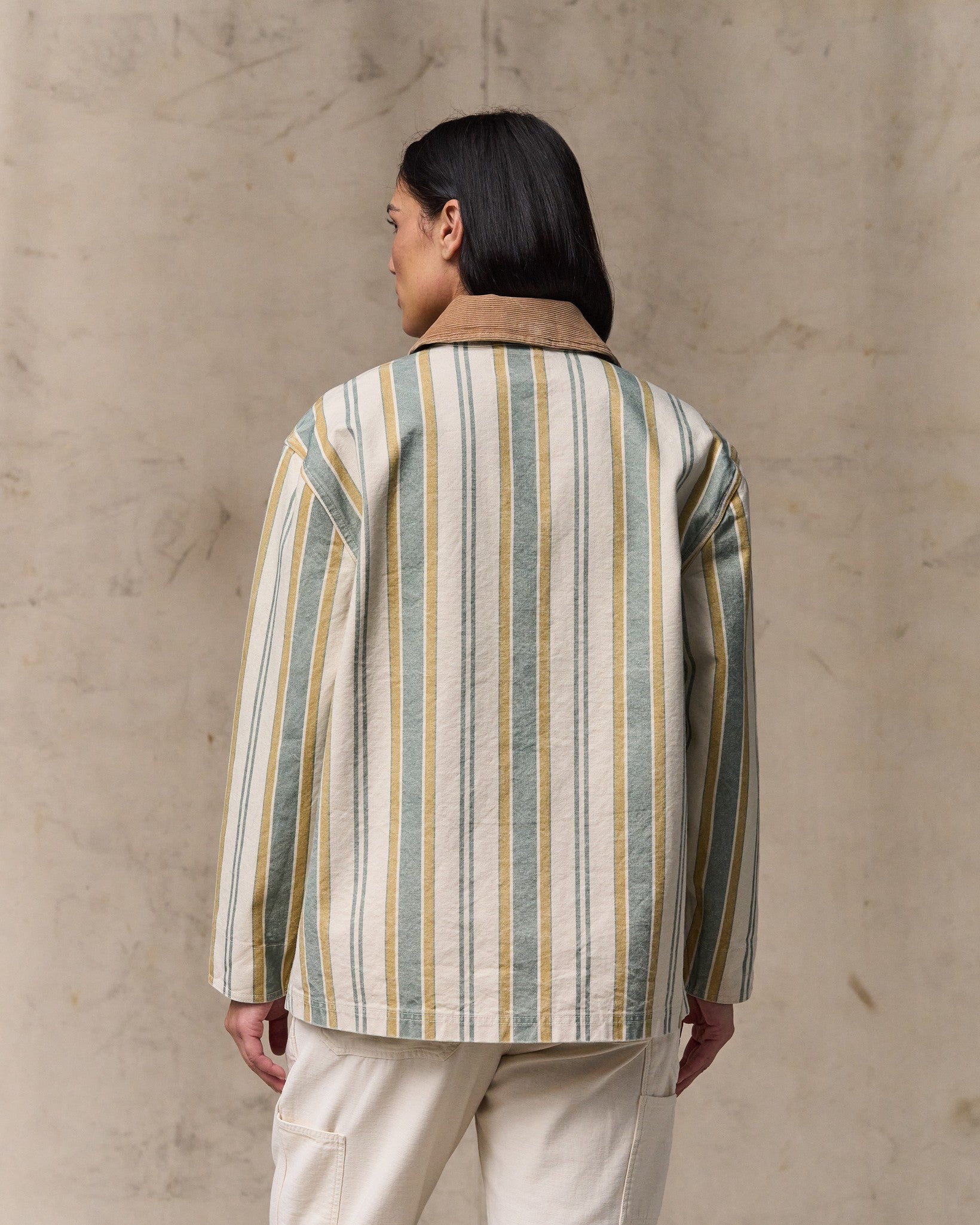 image of a model wearing Filson's Women's Canvas Barn Coat - Natural / Yellow