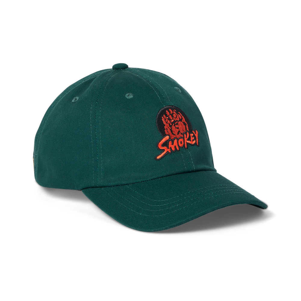 Front-facing image of the Filson Smokey Bear Logger Cap - Dark Green / Smokey