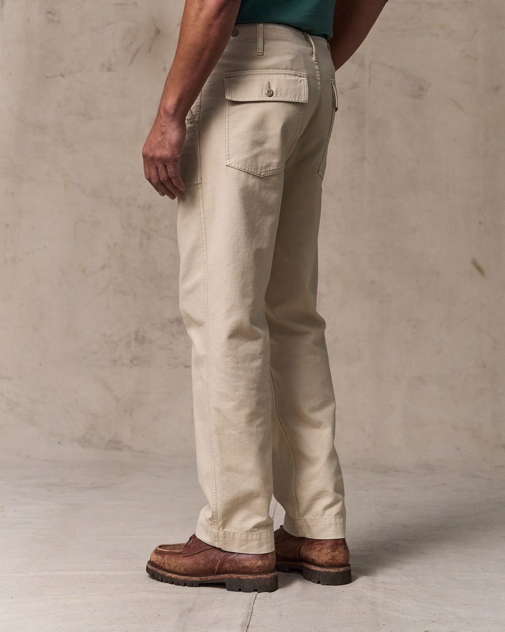 image of a model wearing Filson's Field Supply Pants - Washed Oatmeal