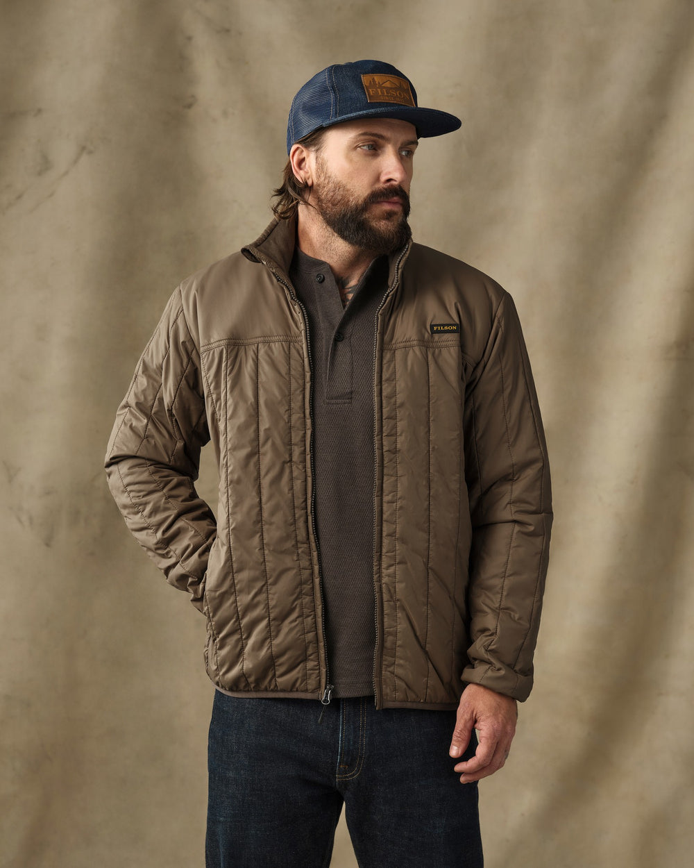 image of a model wearing Filson's Ultralight Jacket - Teak