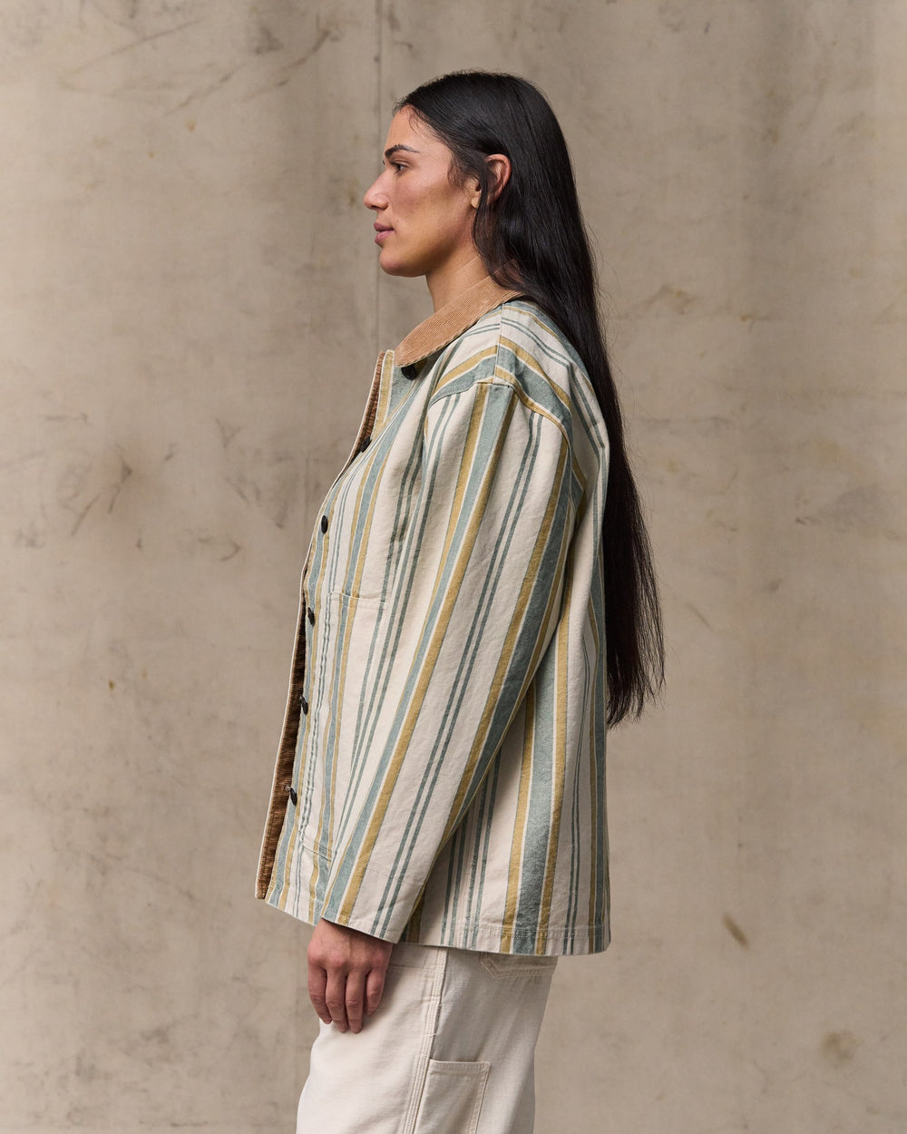 image of a model wearing Filson's Women's Canvas Barn Coat - Natural / Yellow