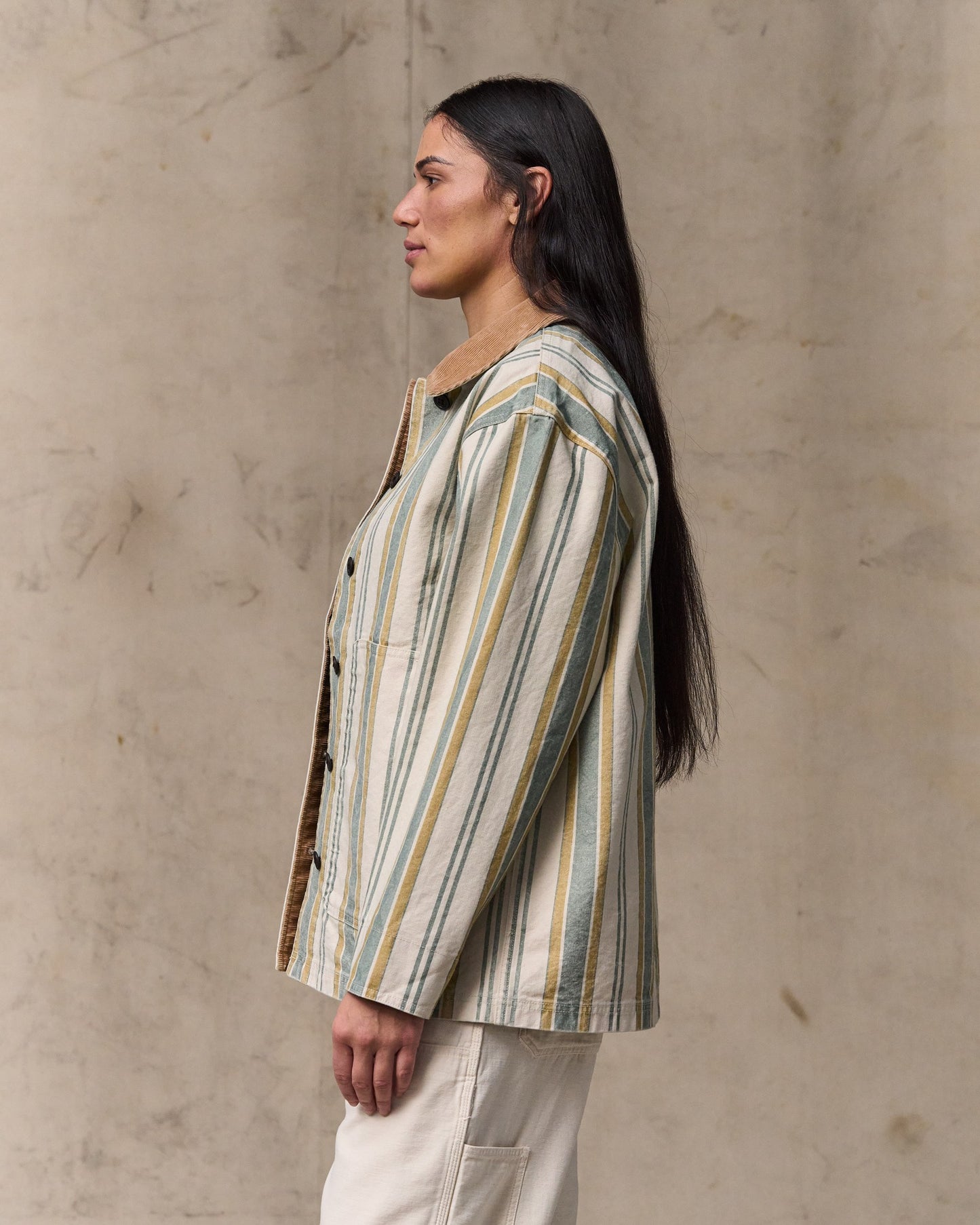 image of a model wearing Filson's Women's Canvas Barn Coat - Natural / Yellow