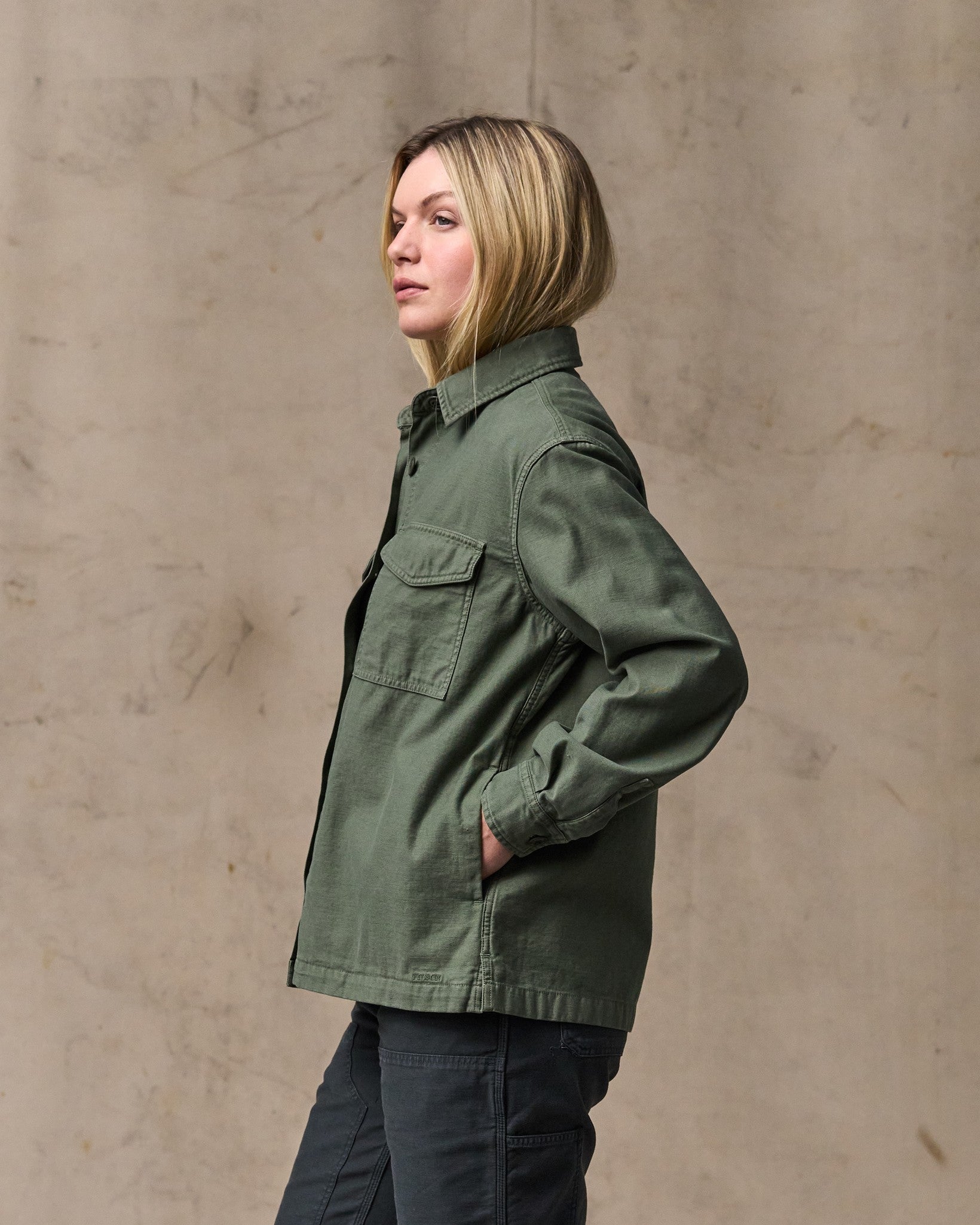 image of a model wearing Filson's Women's Reverse Sateen Jac-shirt - Service Green