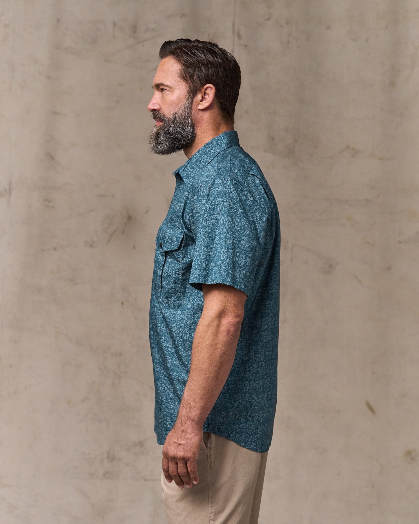 image of a model wearing Filson's Filson's Washed Short Sleeve Feather Cloth Shirt - Blue / Print