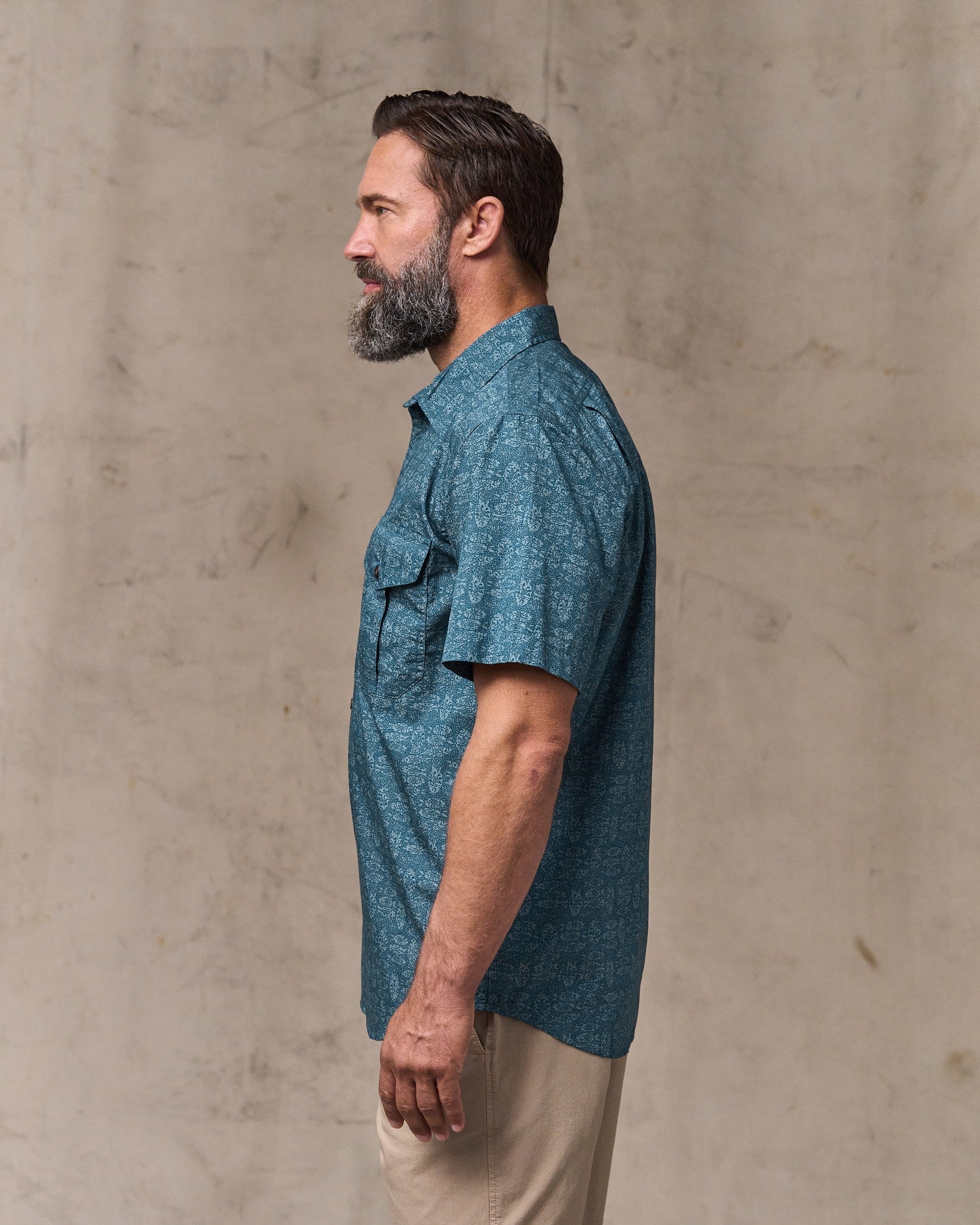 image of a model wearing Filson's Filson's Washed Short Sleeve Feather Cloth Shirt - Blue / Print
