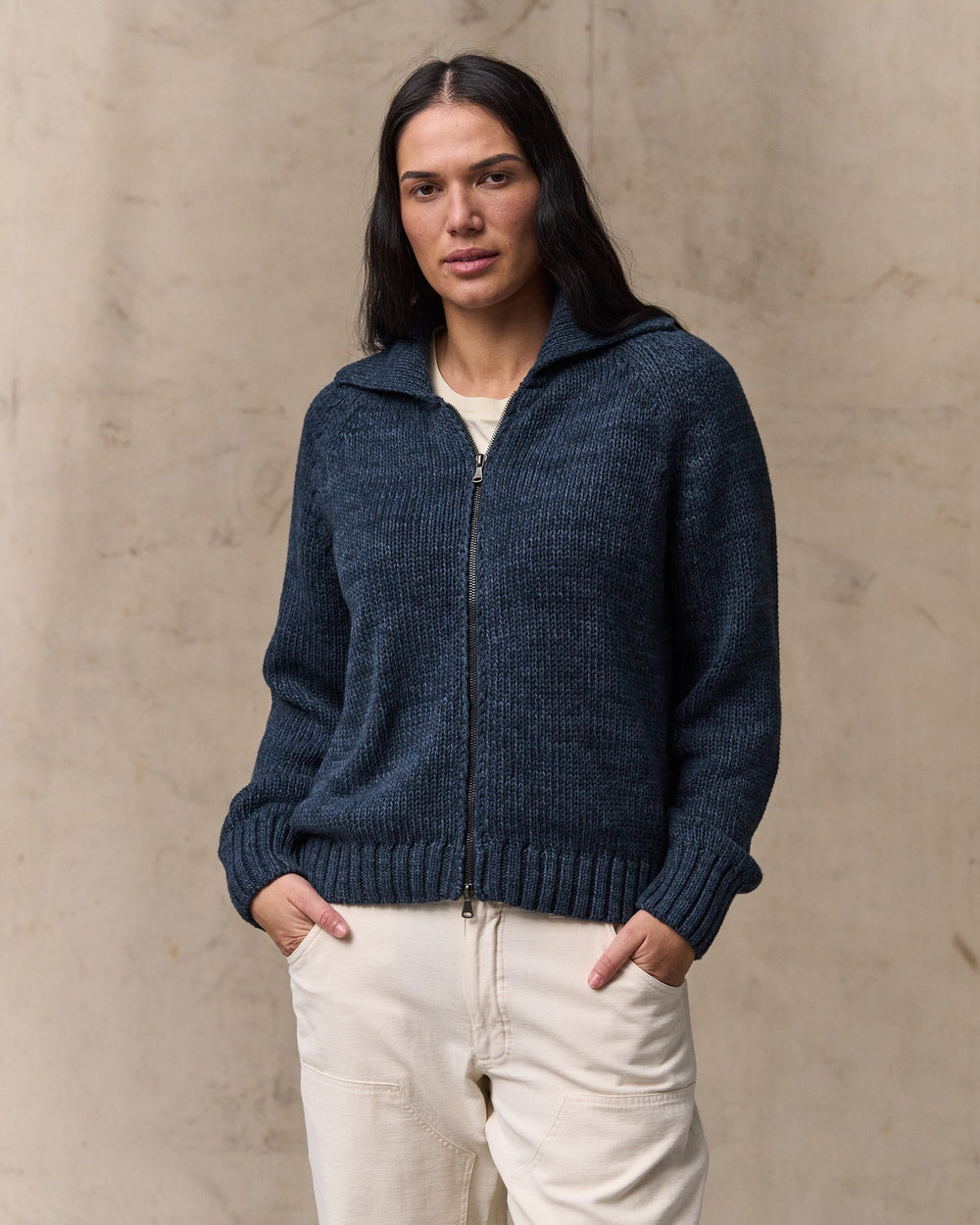 image of a model wearing Filson's Women's Cotton Full-zip Cardigan - Navy / Marl