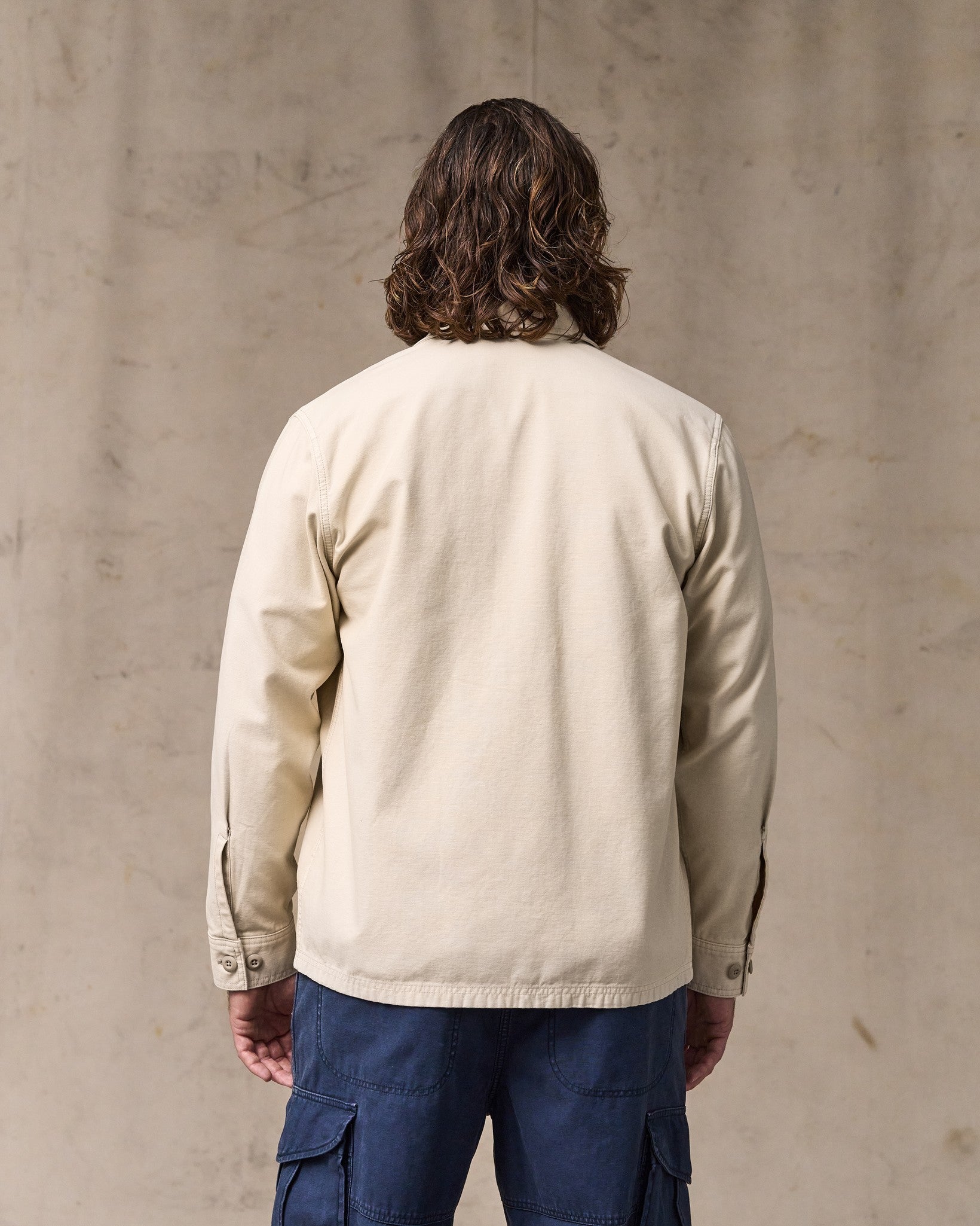 image of a model wearing Filson's Field Jac-shirt - Washed Oatmeal