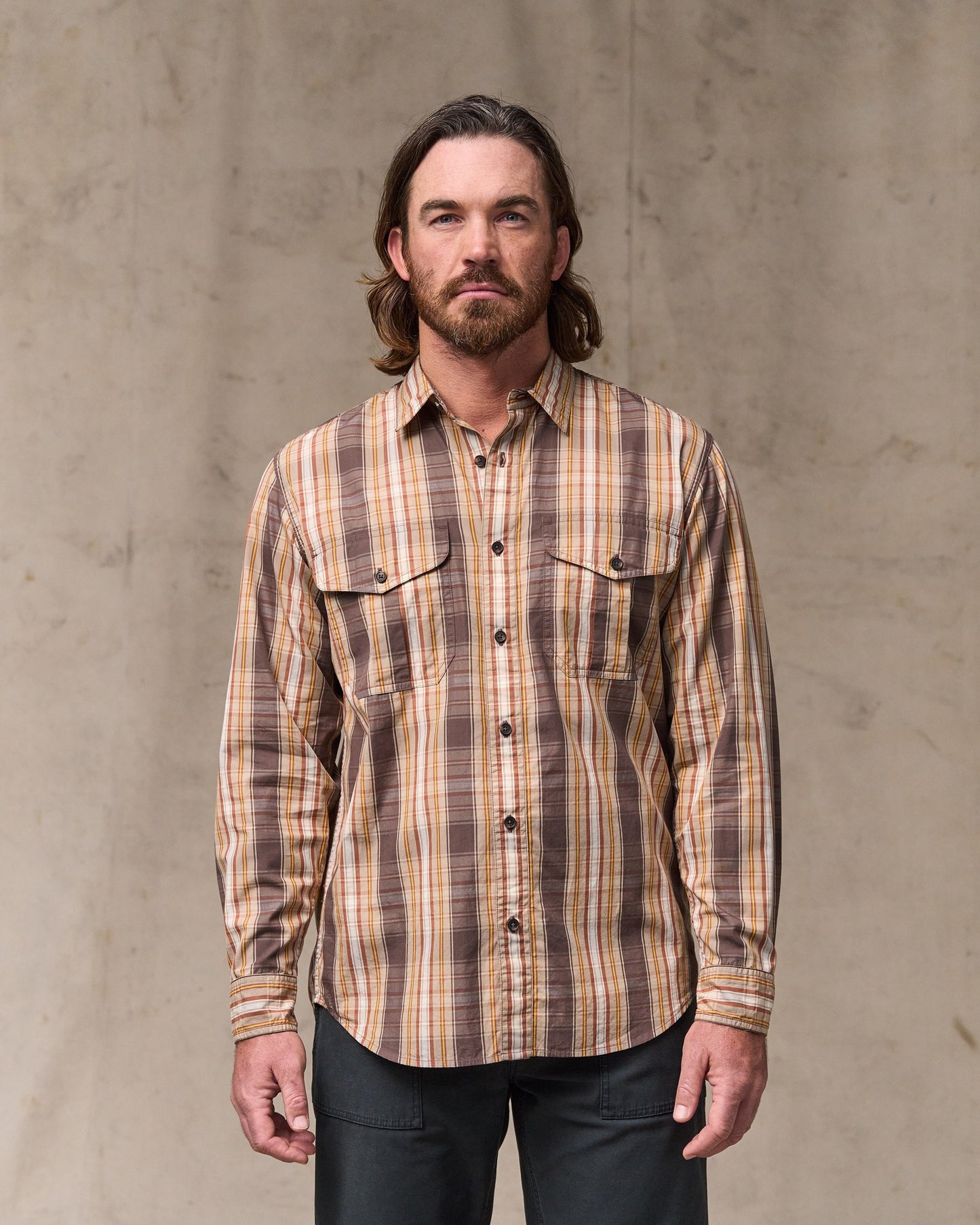 image of a model wearing Filson's Filson's Washed Feather Cloth Shirt - Brown Multi Plaid|Model is 6'1" wearing a size medium