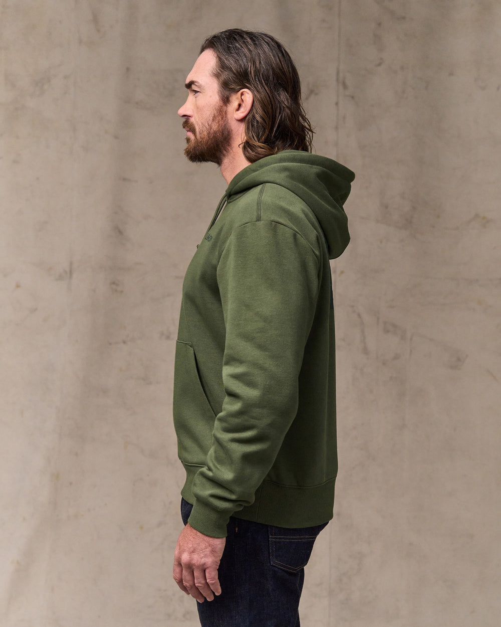 image of a model wearing Filson's Scenic Graphic Hoodie - Surplus Green