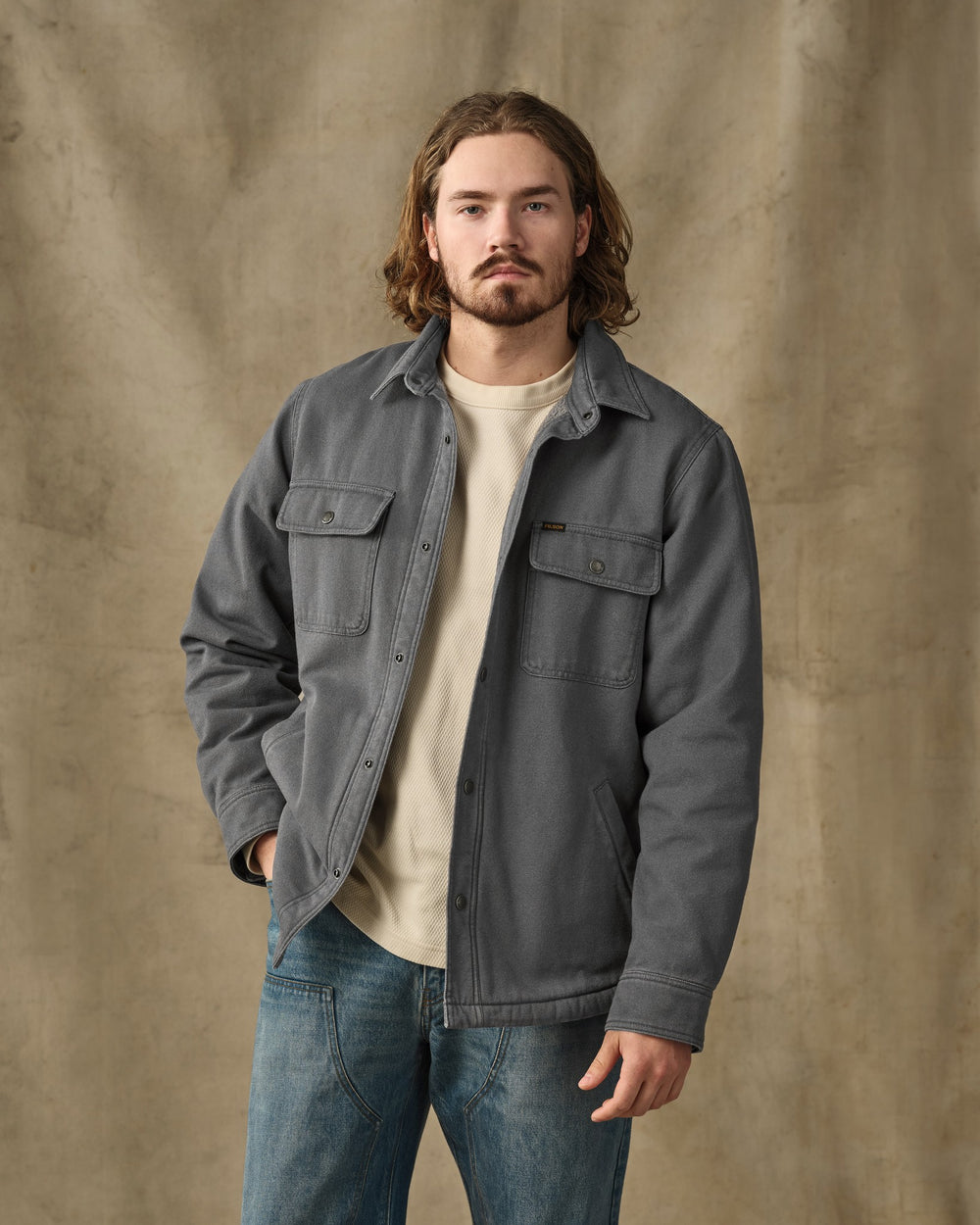 image of a model wearing Filson's Fleece Lined Jac-Shirt - Rockslide Gray