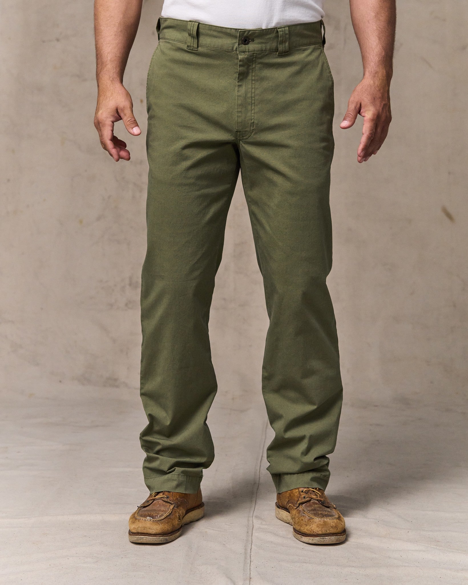 image of a model wearing Filson's Granite Mountain Flat Front Pants - Burnt Olive