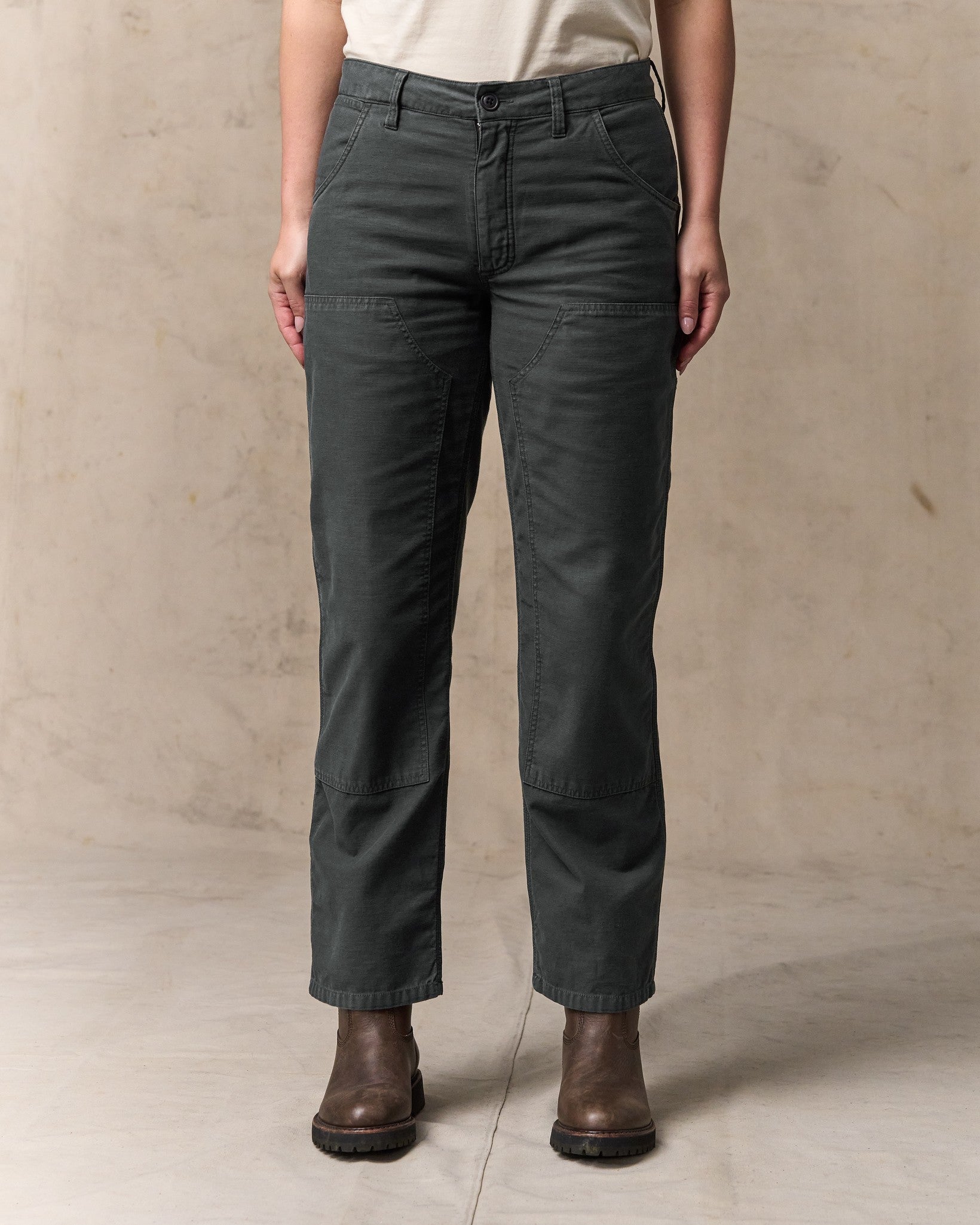 image of a model wearing Filson's Women's Reverse Sateen Double Front Pants - Faded Black