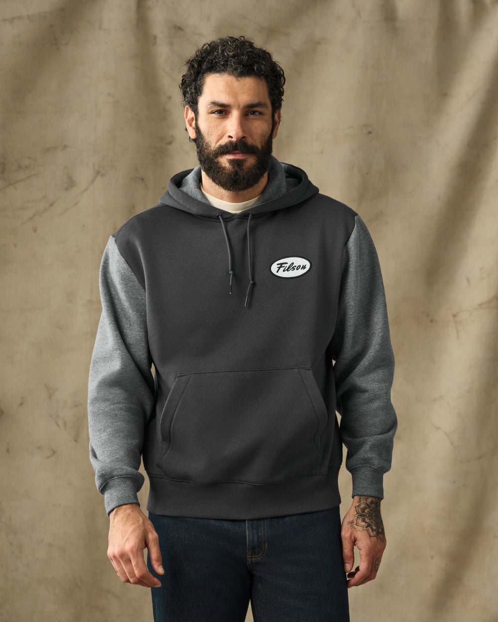 image of a model wearing Filson's Mallard Graphic Hoodie - Faded Black