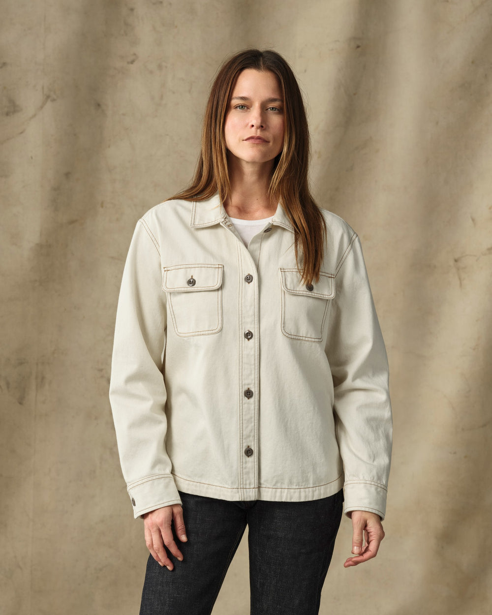 image of a model wearing Filson's Women's Denim Shirt - Natural Seed