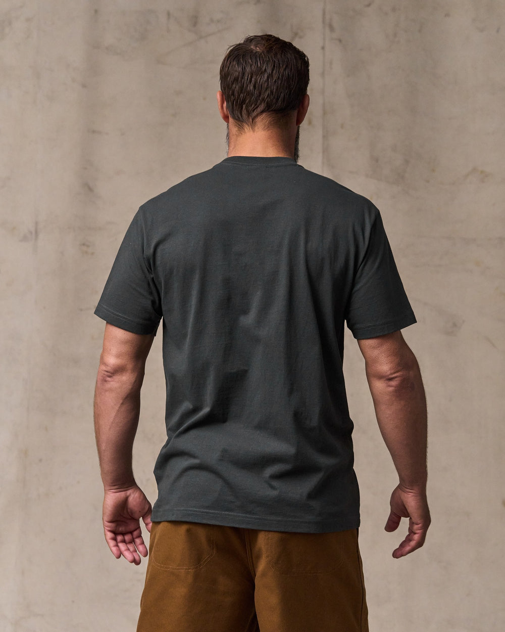 image of a model wearing Filson's Outfitter Pocket T-shirt - Faded Black