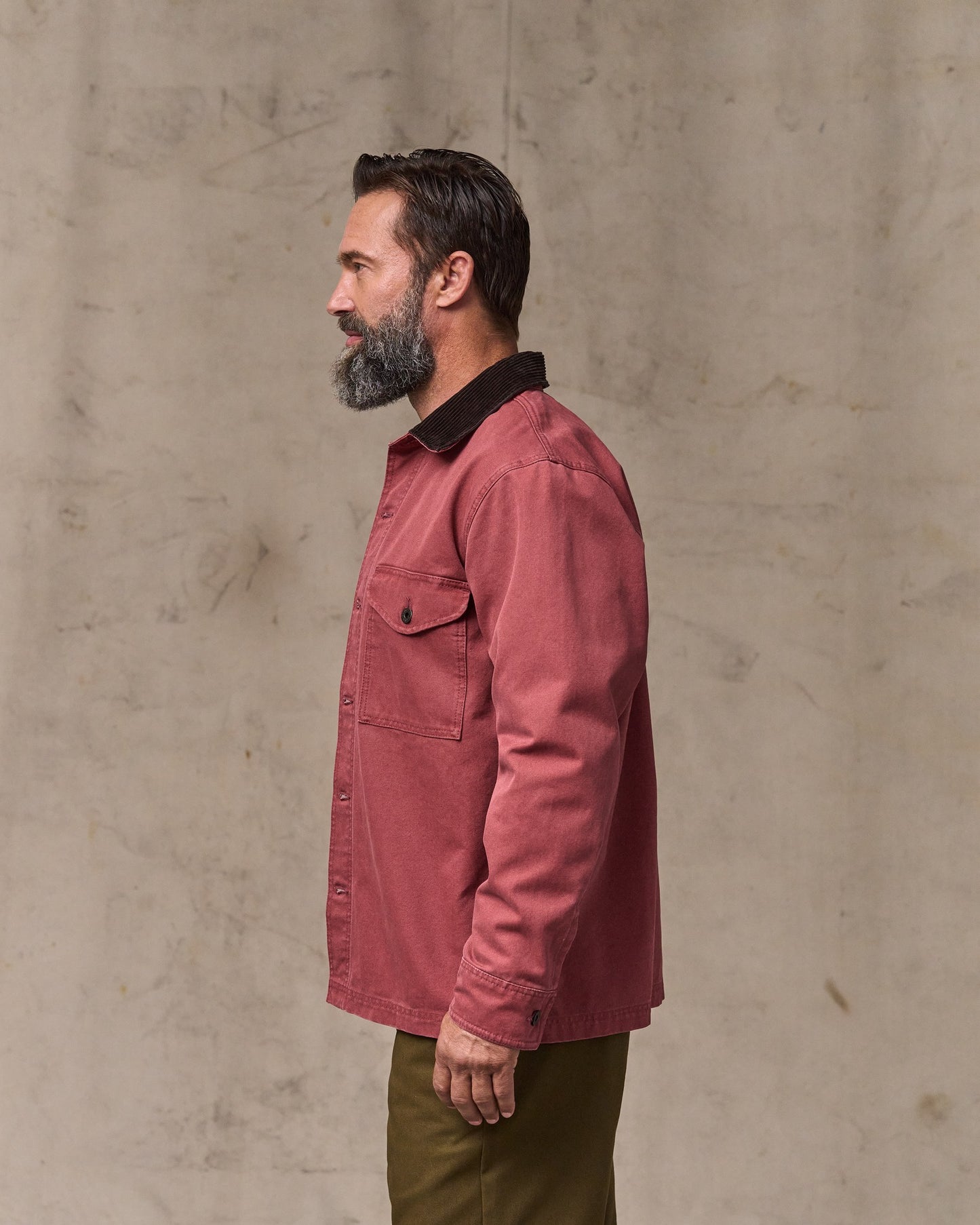 image of a model wearing Filson's Rustic Canvas Jac-shirt - Red Rock
