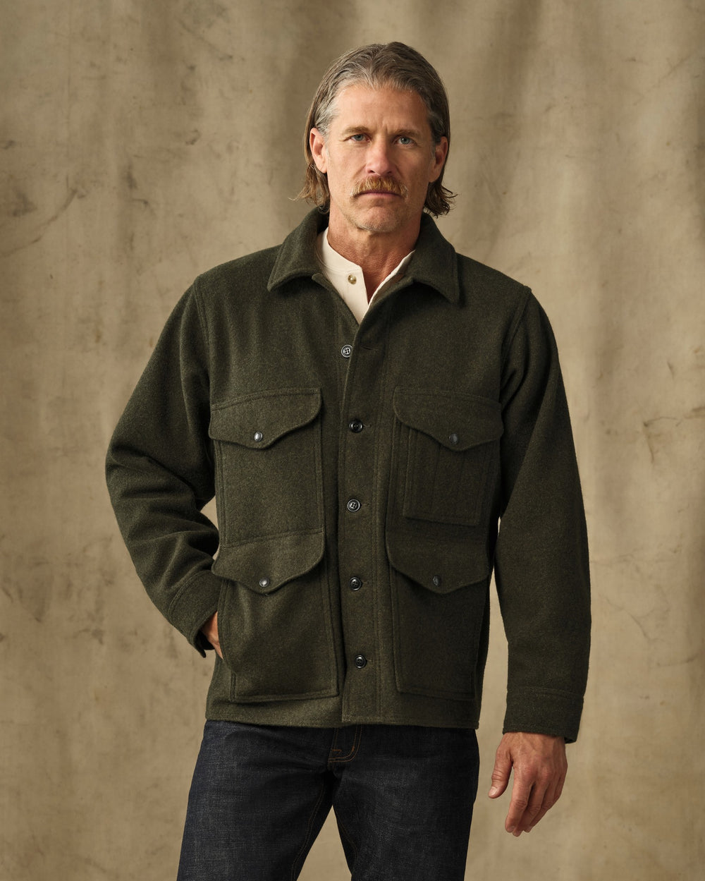 image of a model wearing Filson's Mackinaw Wool Cruiser Jacket - Forest Green