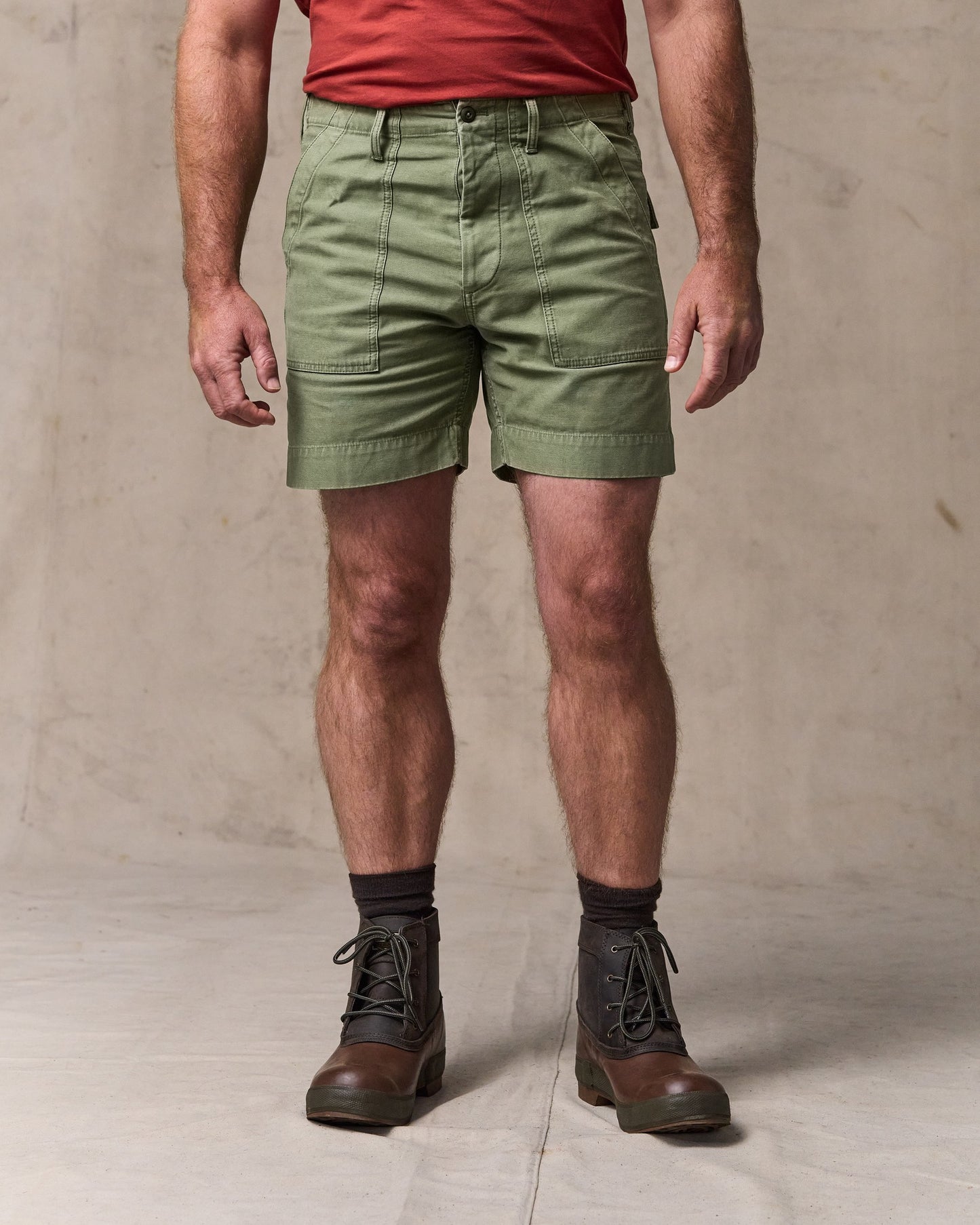 image of a model wearing Filson's Field Supply Shorts - Washed Fatigue Green|Model is 6'1" wearing a size 34”