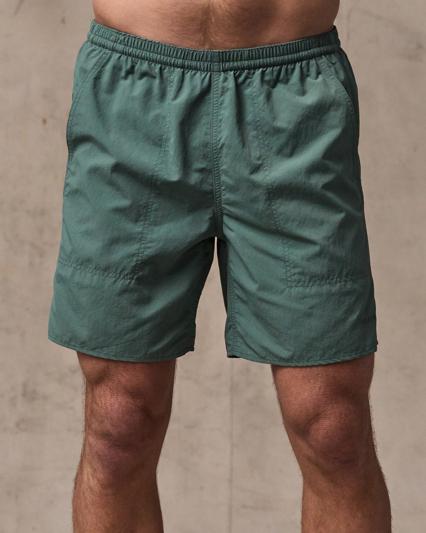 image of a model wearing Filson's Oxbow Lake Trunks - Dark Forest|Model is 6'1" wearing a size medium
