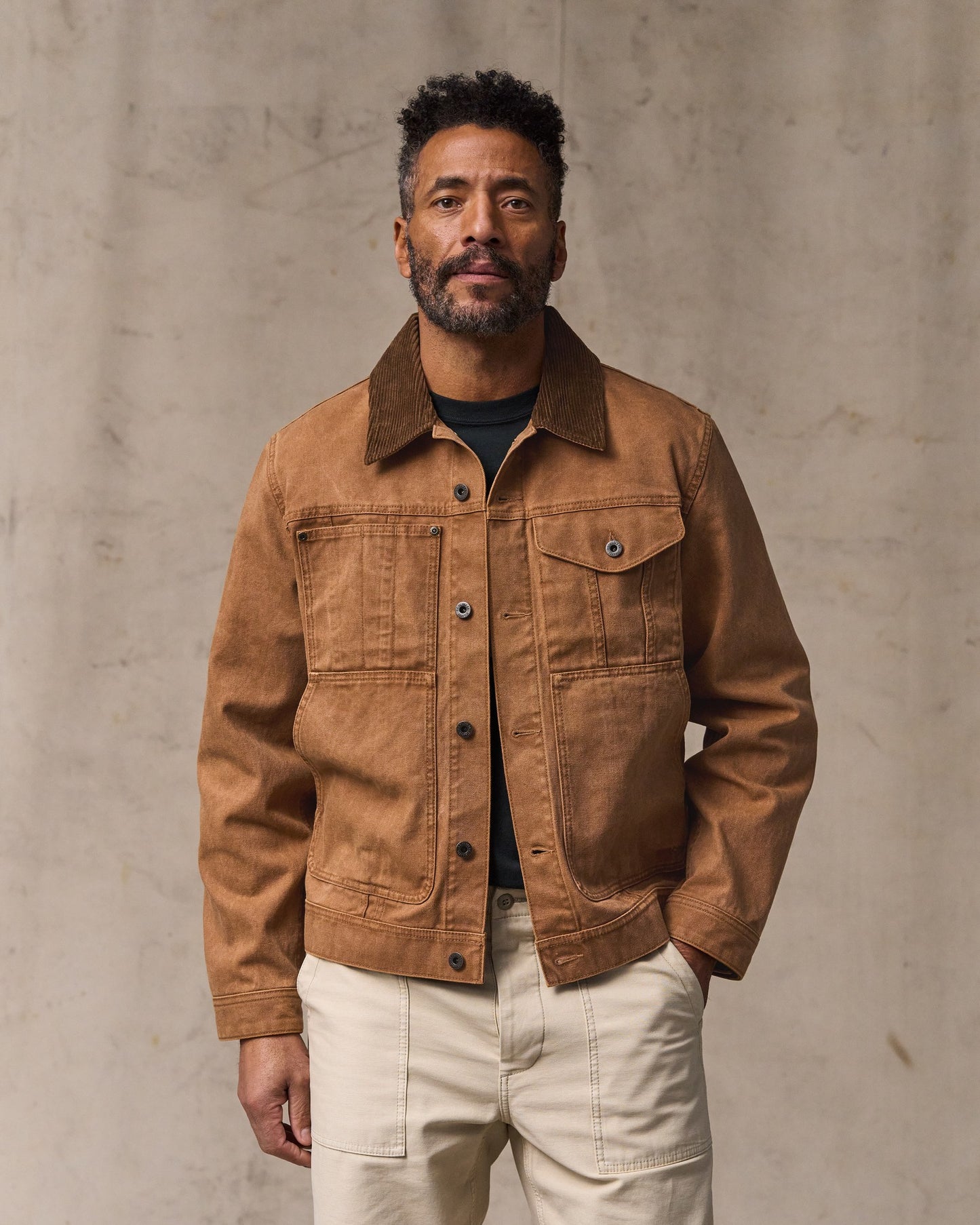 image of a model wearing Filson's Rustic Canvas Short Cruiser Jacket - Whiskey|Model is 6'2" wearing a size medium