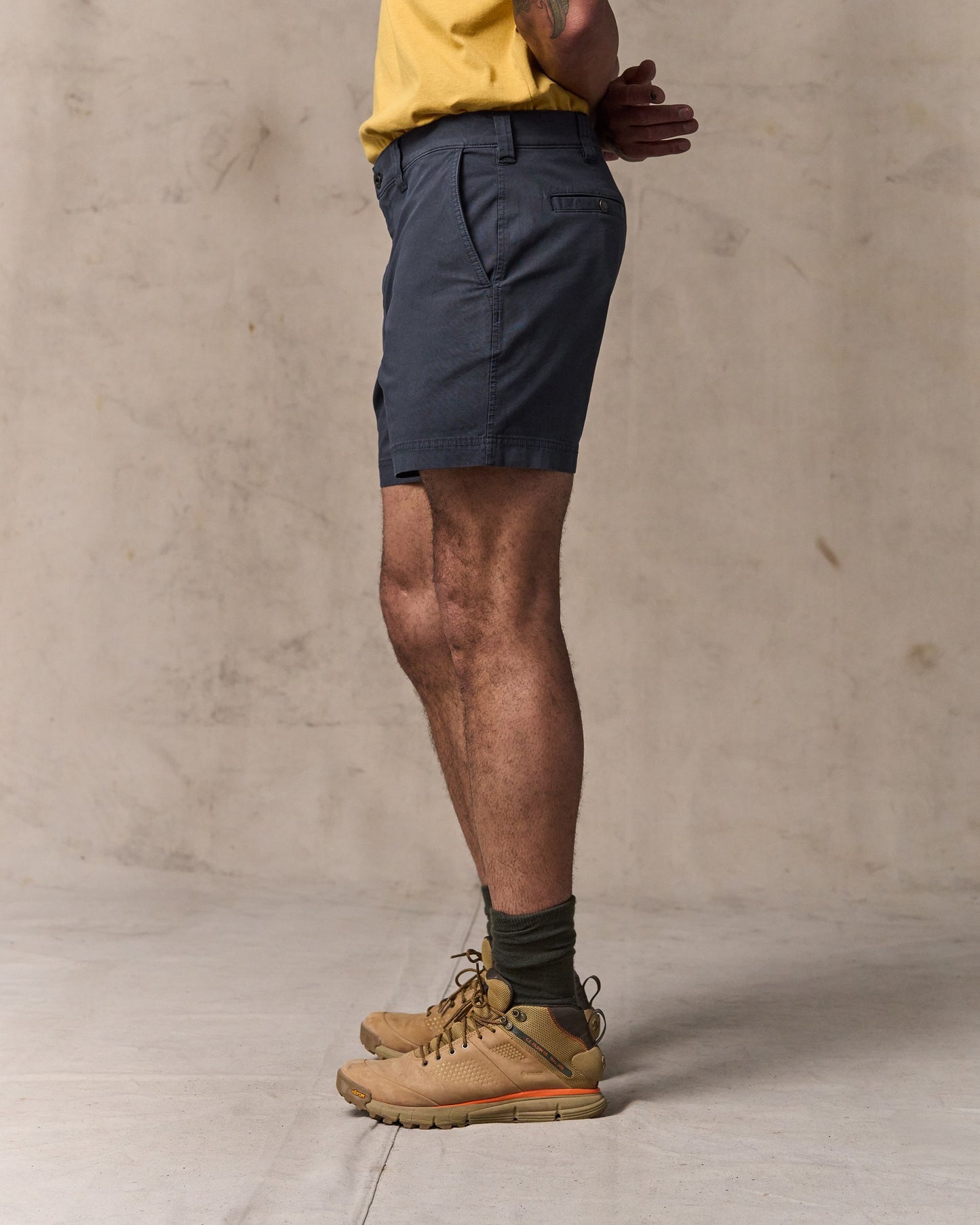 image of a model wearing Filson's Granite Mountain 6" Shorts - Ink Blue