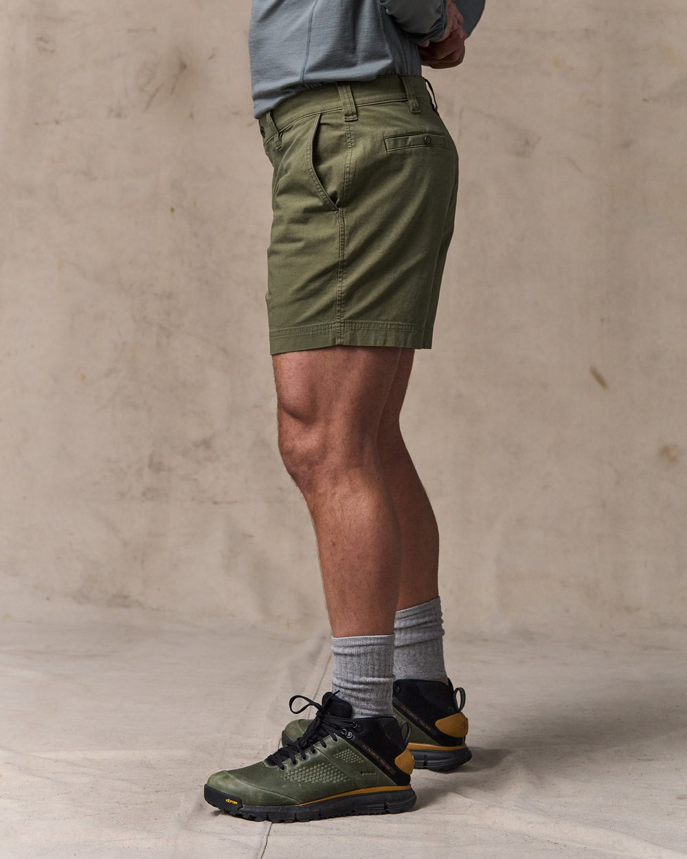 image of a model wearing Filson's Granite Mountain 6" Shorts - Burnt Olive