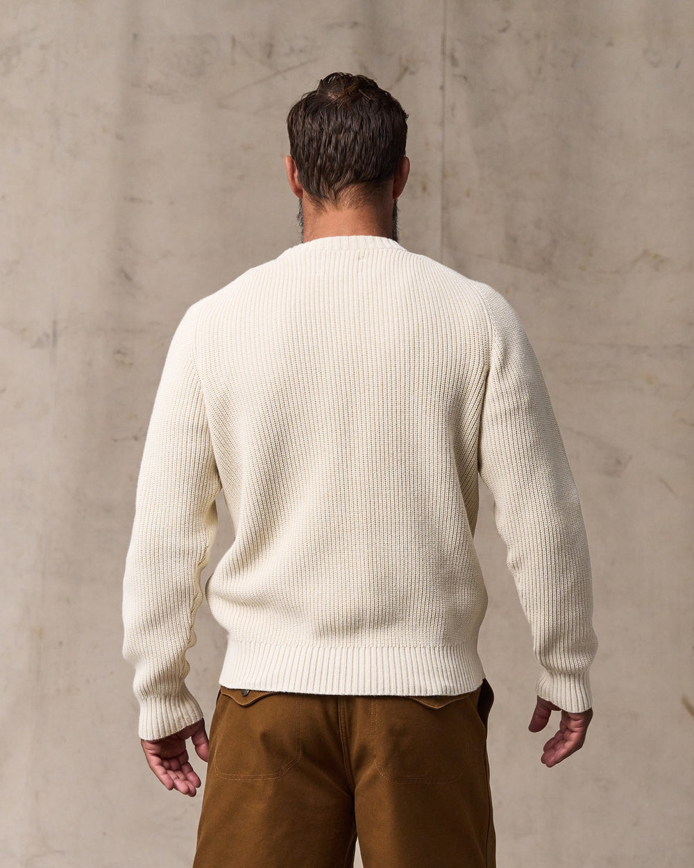 image of a model wearing Filson's Vintage Cotton Crewneck Sweater - Natural