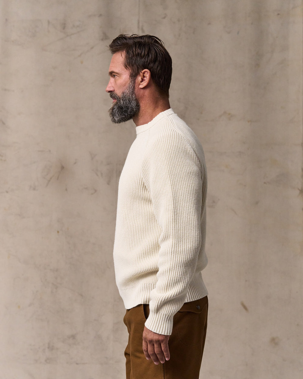 image of a model wearing Filson's Vintage Cotton Crewneck Sweater - Natural
