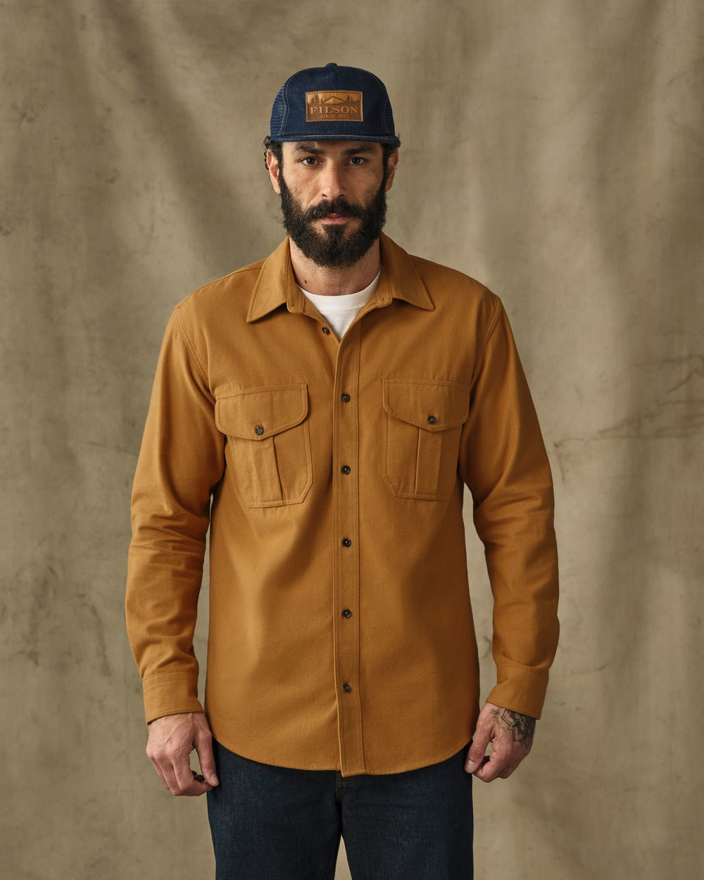 image of a model wearing Filson's Moleskin Guide Shirt - Wood Thrush
