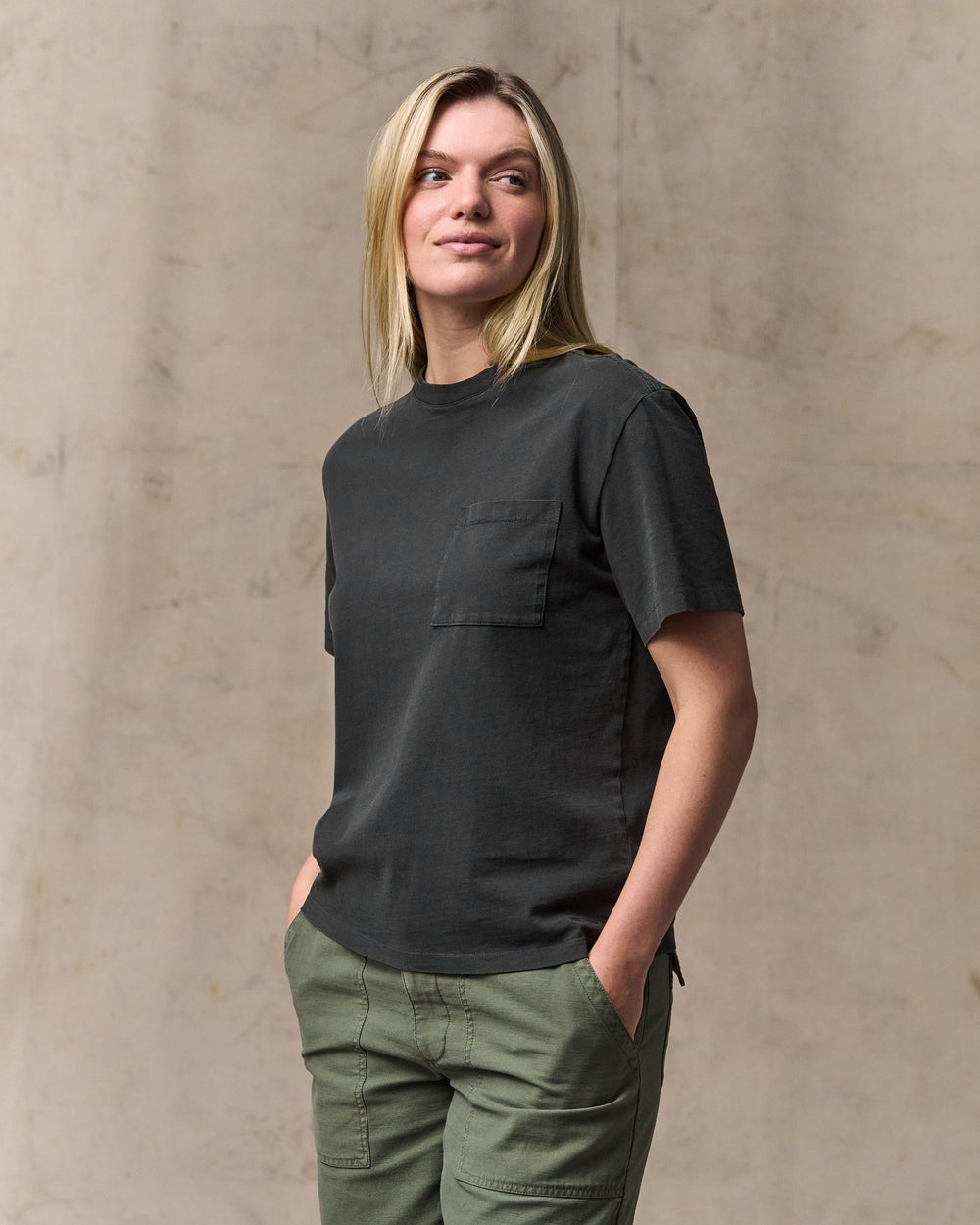 image of a model wearing Filson's Women's Short Sleeve Pocket Tee - Faded Black