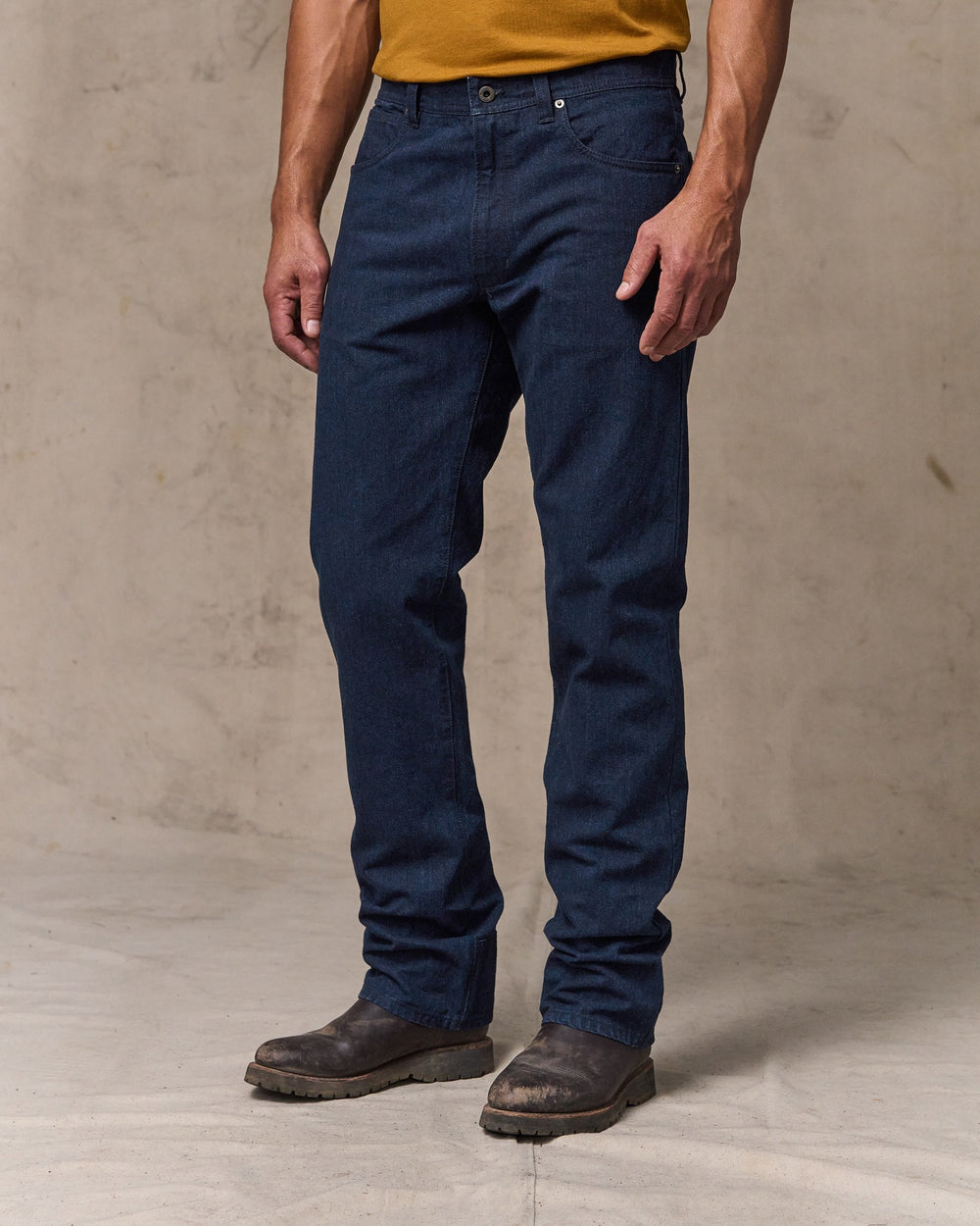 image of a model wearing Filson's Dry Tin Cloth 5-pocket Pants - Indigo
