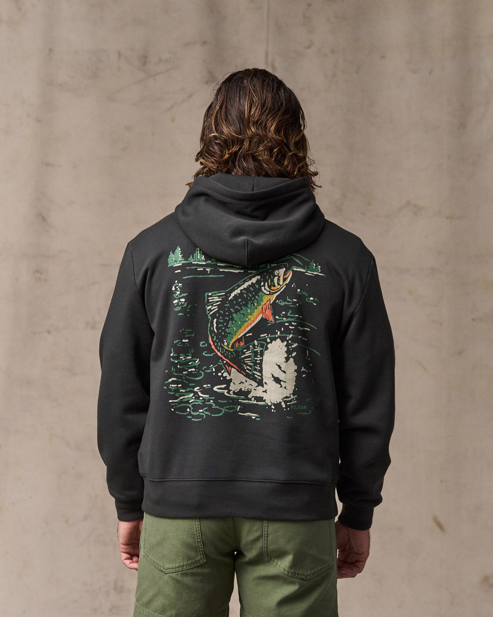 image of a model wearing Filson's Trout Graphic Hoodie - Faded Black