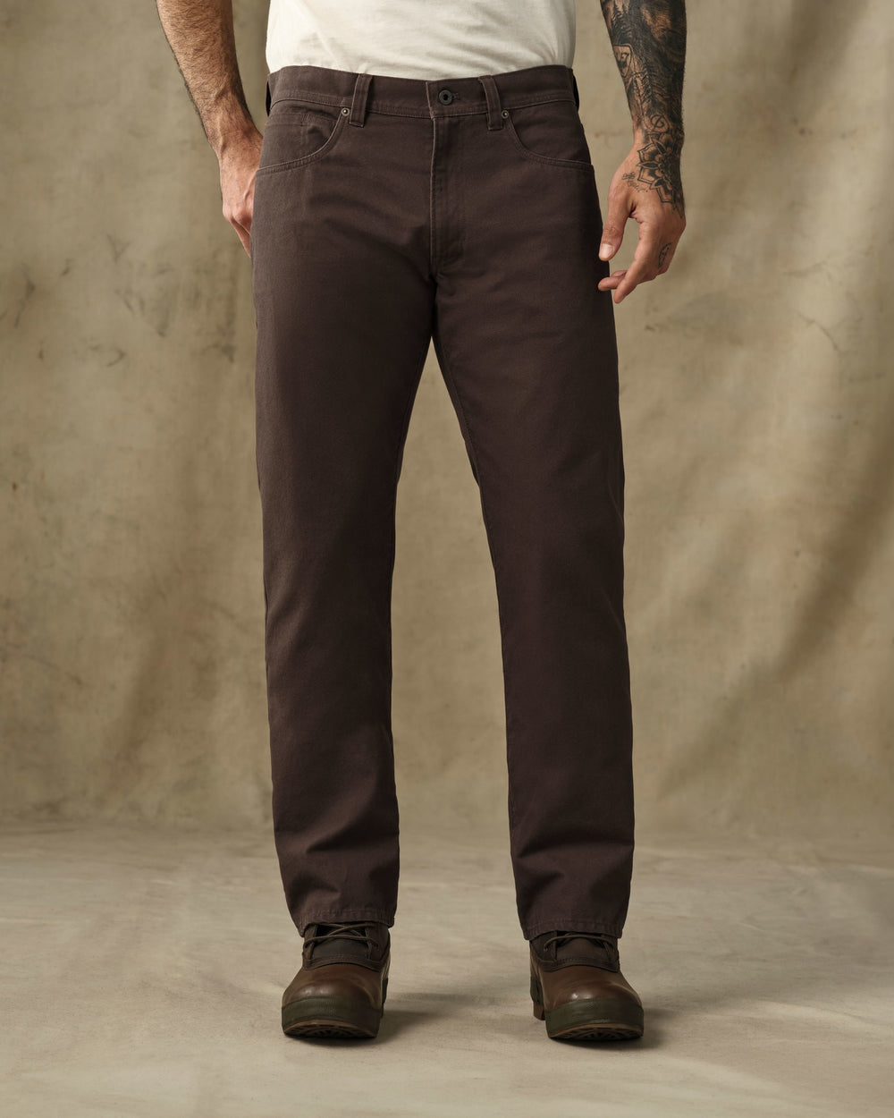 image of a model wearing Filson's Dry Tin Cloth 5-Pocket Pants - Seal Brown