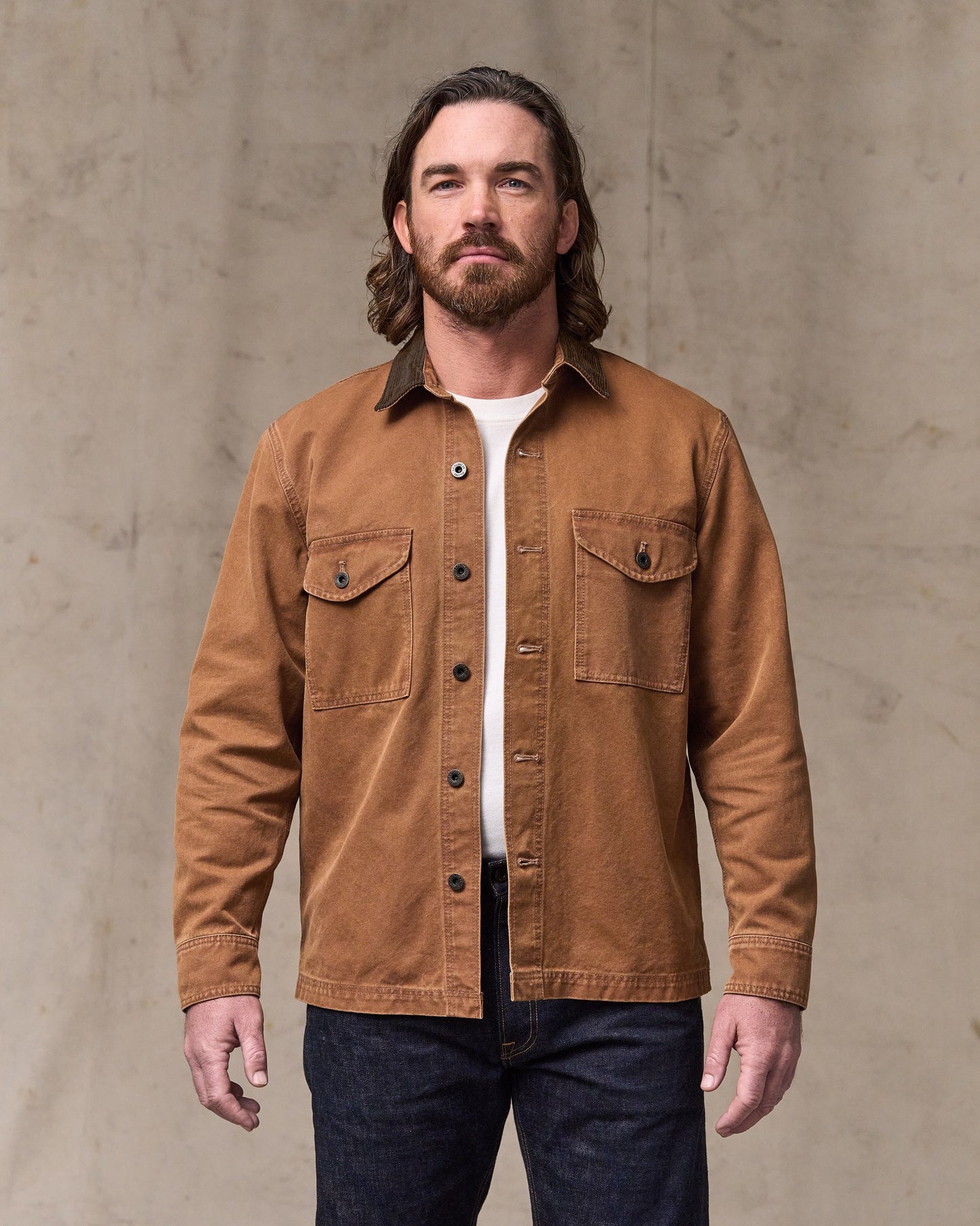image of a model wearing Filson's Rustic Canvas Jac-shirt - Whiskey|Model is 6'1" wearing a size medium