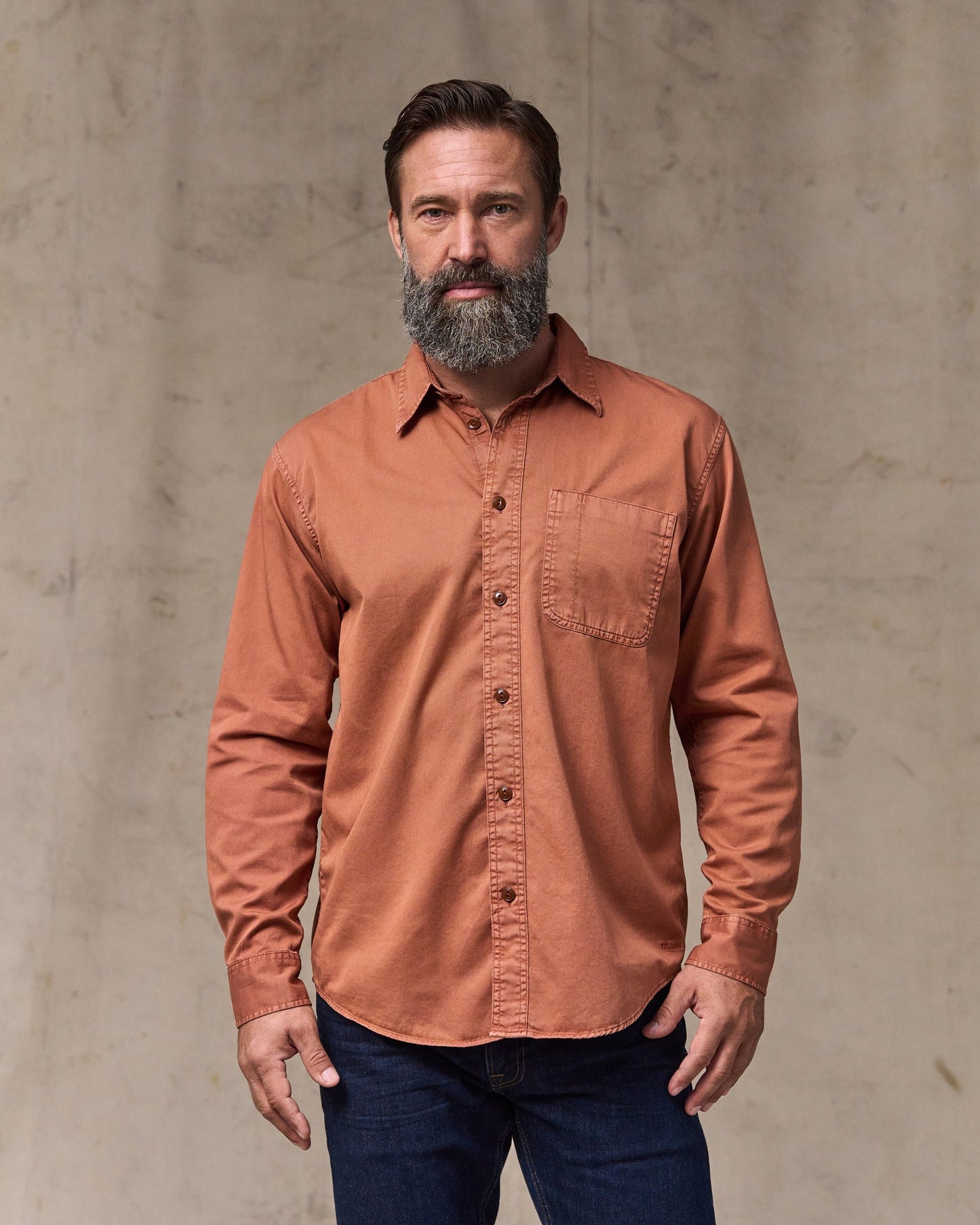 image of a model wearing Filson's 4.5-oz. Twill Shirt - Copper Brown|Model is 6'1" wearing a size medium
