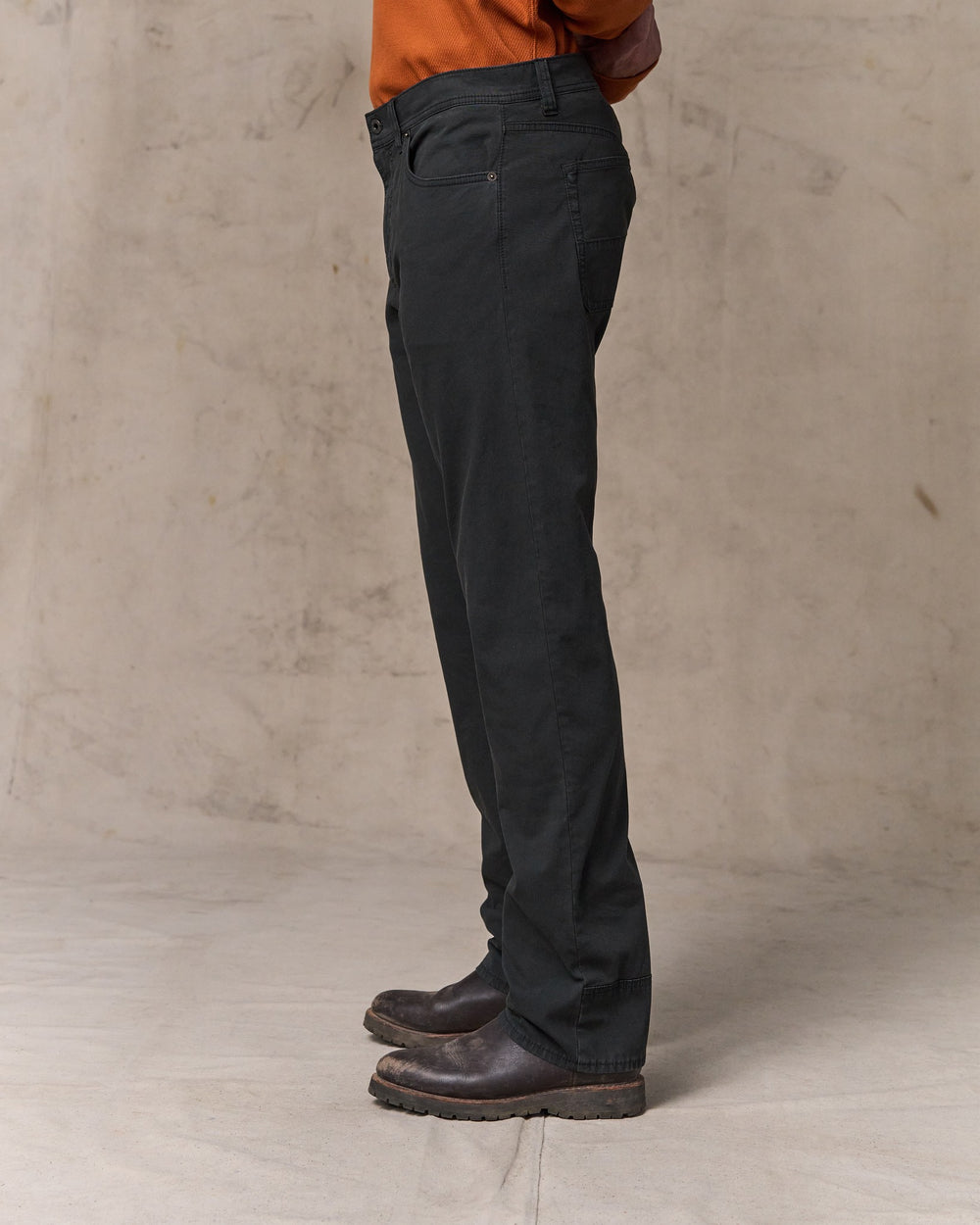 image of a model wearing Filson's Granite Mountain 5-pocket Pants - Washed Faded Black